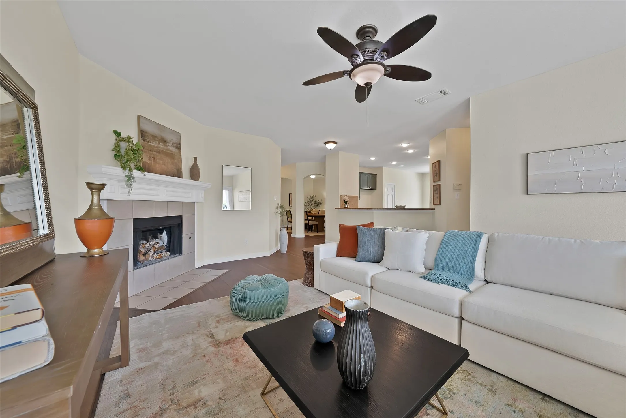 Fireplace with tile surround and mantel