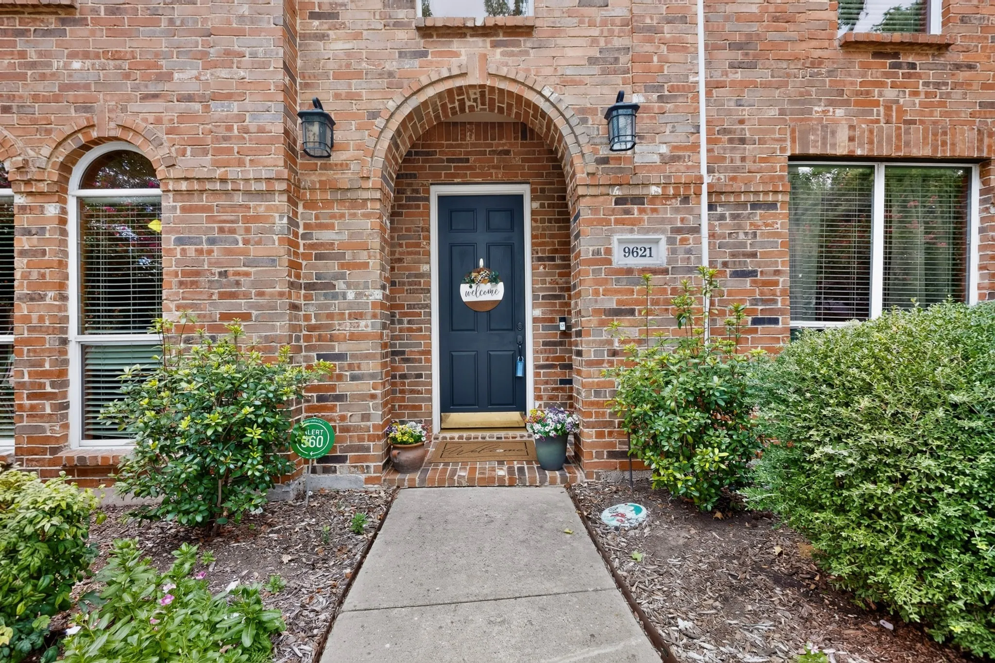 Brick exterior with arched entryway