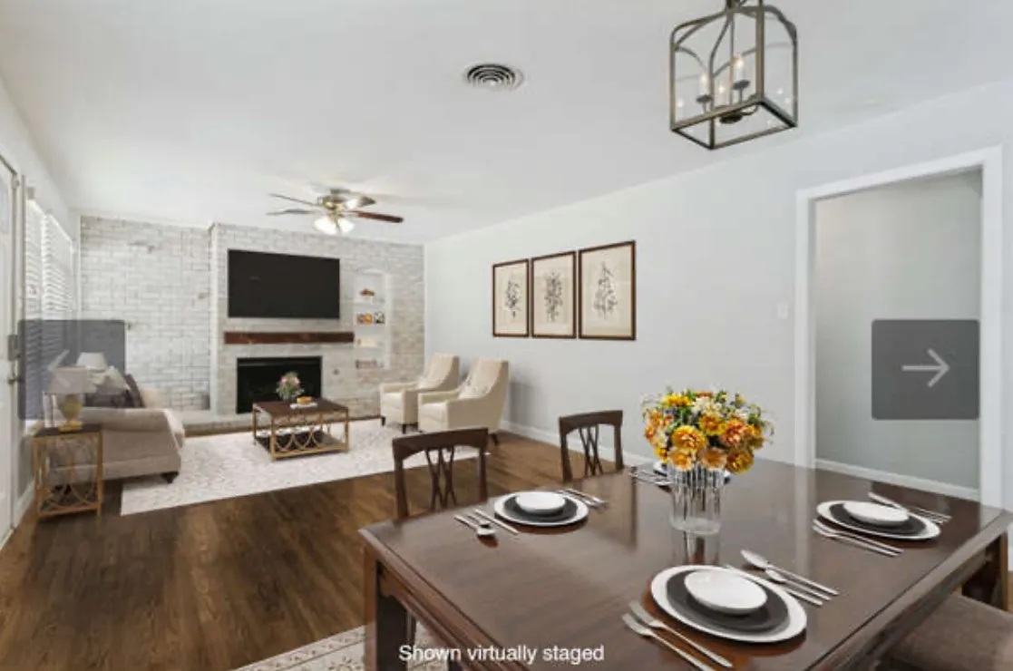 Virtually staged to show flexibility f open concept