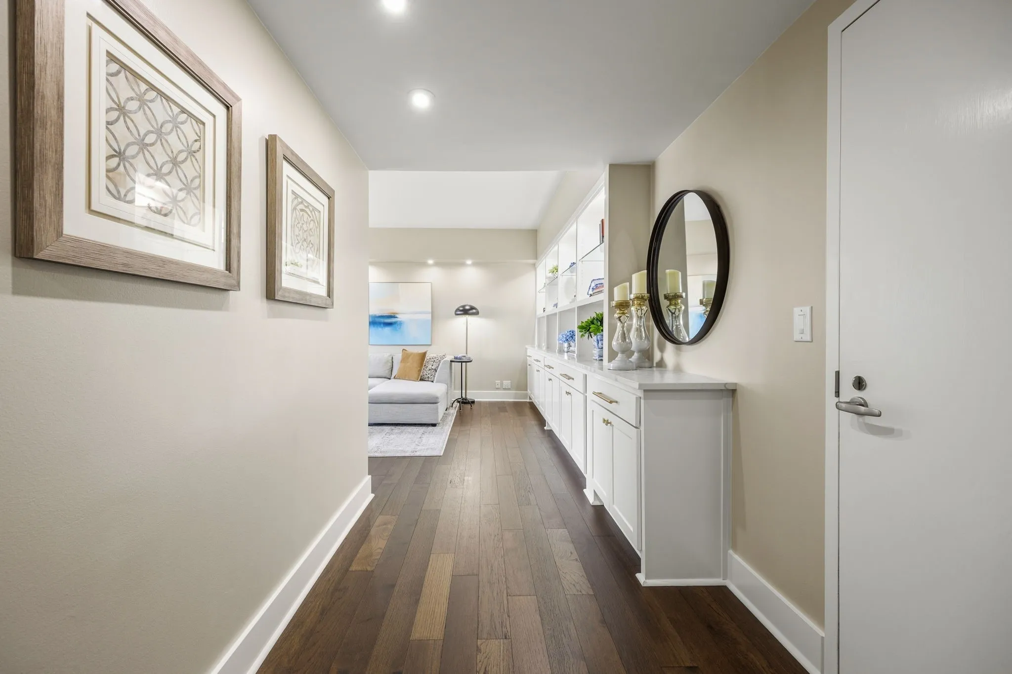Upon entering the unit, you can head right into the inviting living area or follow the hallway to the left toward the bedrooms. Either way, the welcoming entry foyer offers the perfect wall space for showcasing artwork and personal décor.