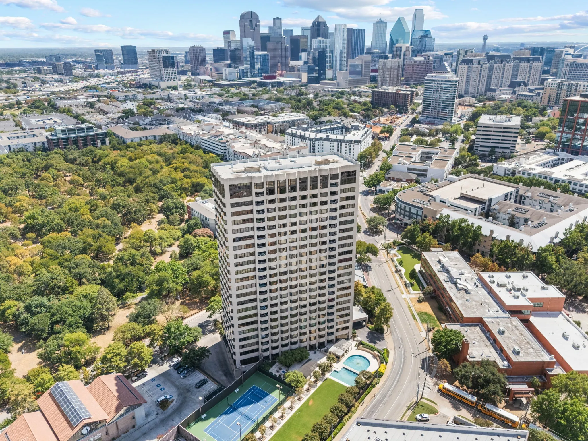 Aerial view of La Tour Condominiums in Uptown with the Downtown Skyline in the background.