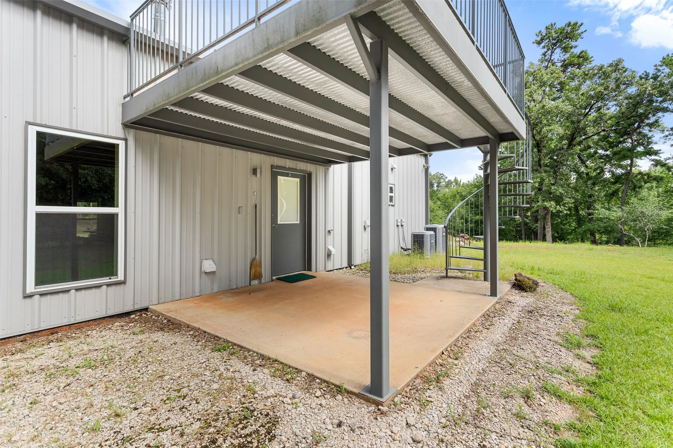 Back patio with deck above
