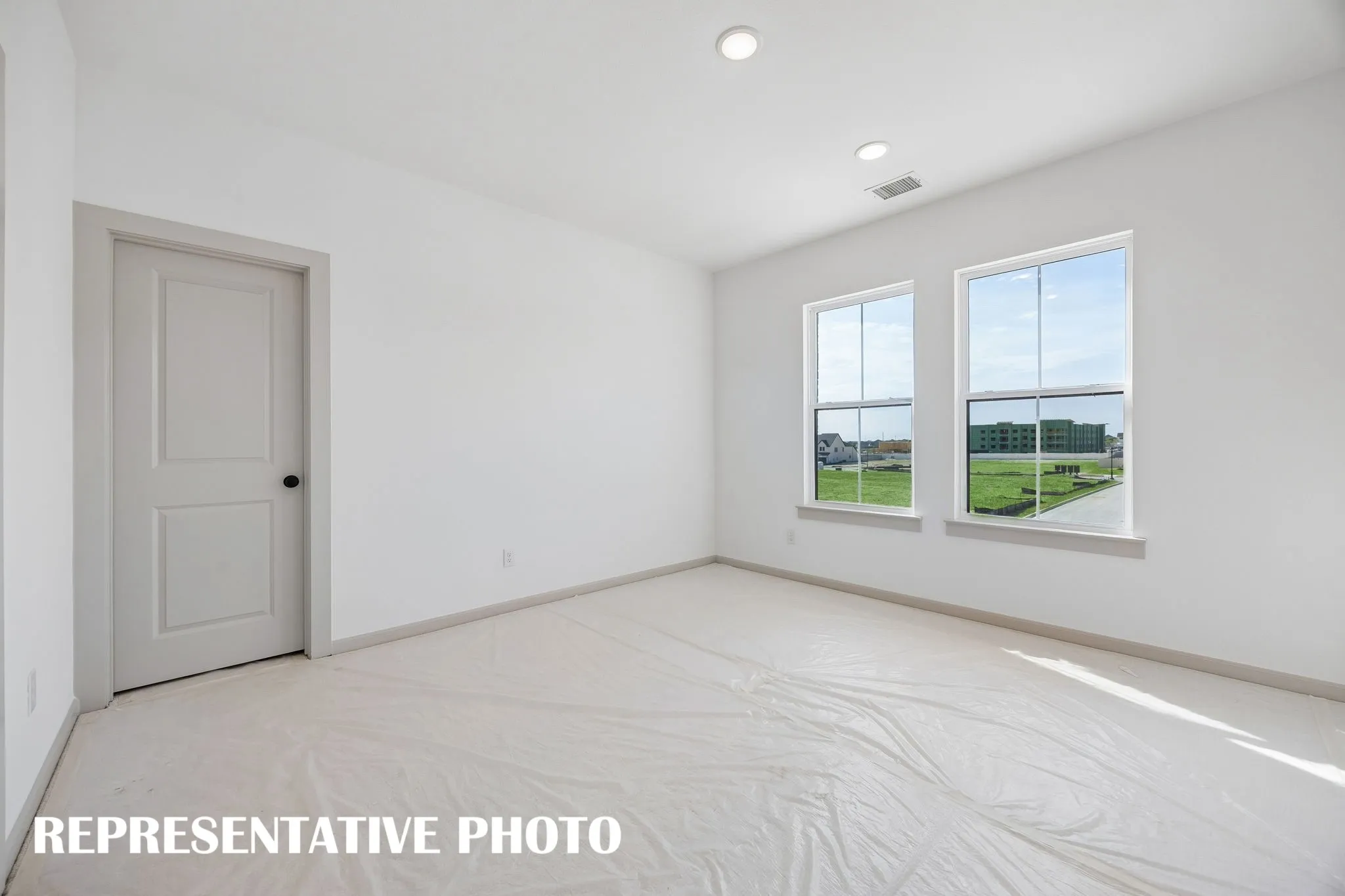 You'll find nicely sized secondary bedrooms in our Orleans II plan.  REPRESENTATIVE PHOTO