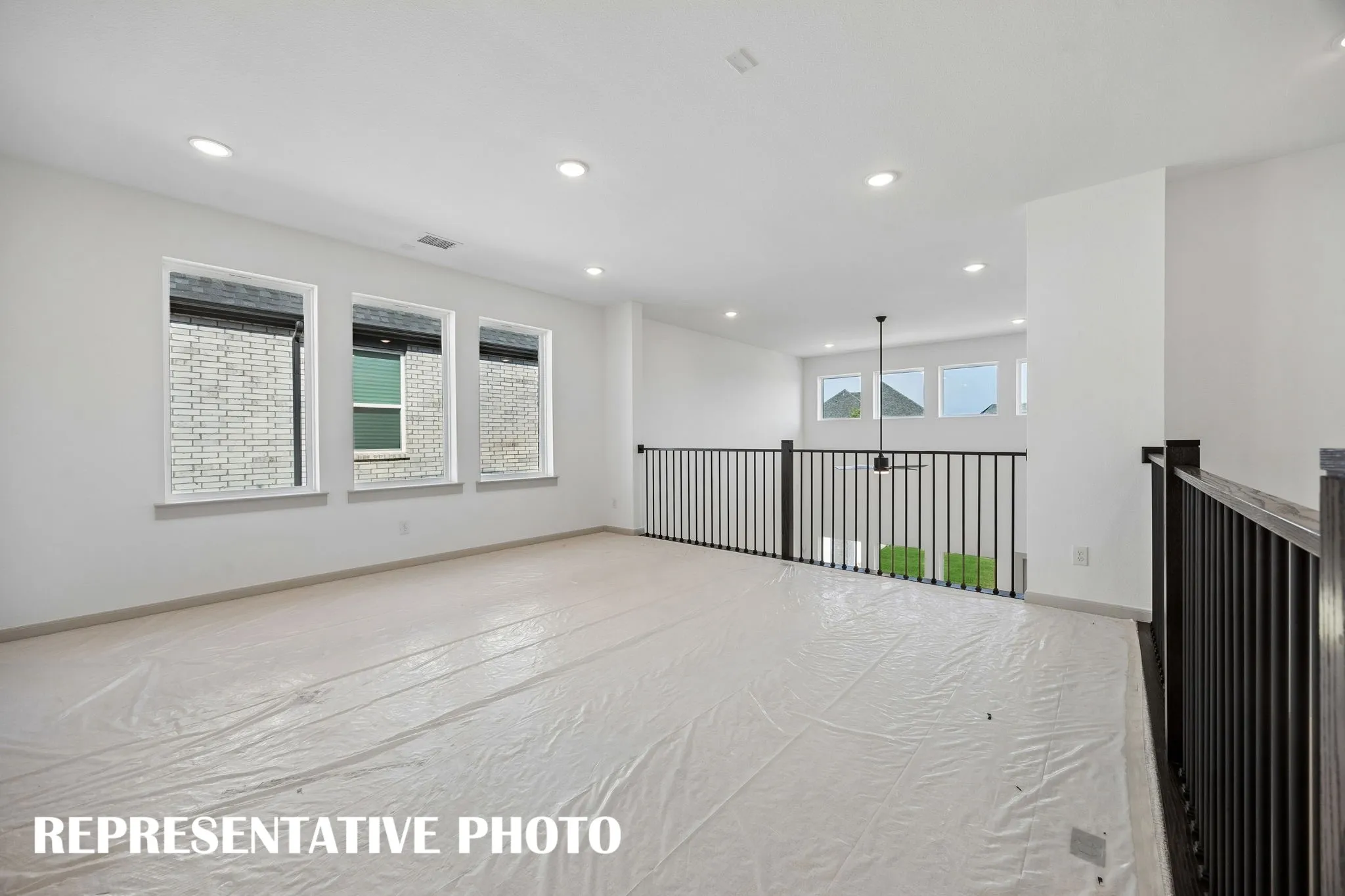 Whether hosting those big game day parties or family game night, this light filled game room is the place to be!  REPRESENTATIVE PHOTO