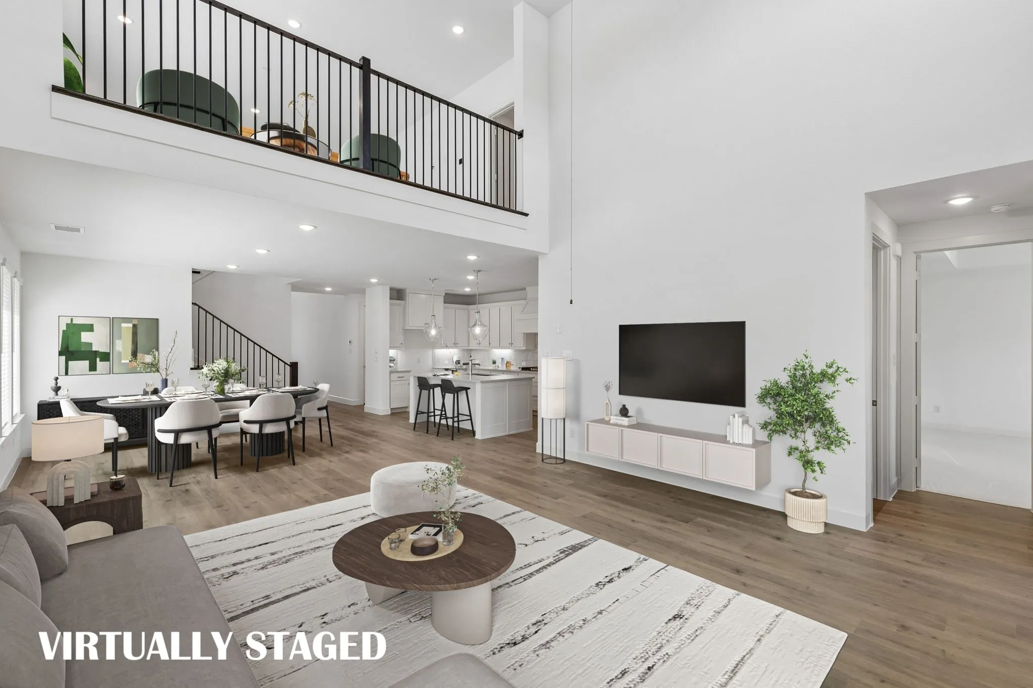 With the game room open to the living room, you'll find multi-level entertainment in this dream home!  VIRTUALLY STAGED