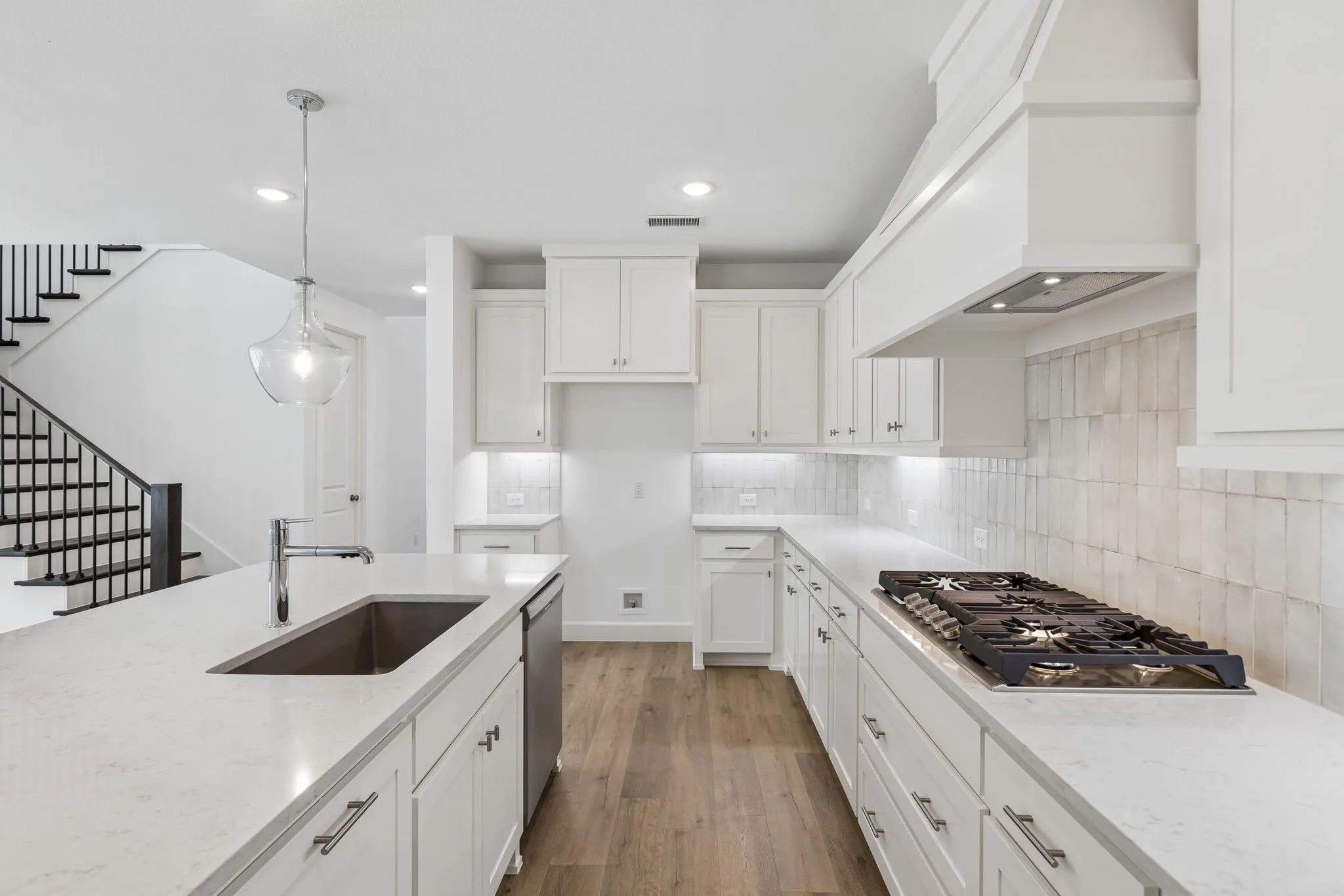 Welcome to your dream kitchen featuring gorgeous cabinetry, contemporary countertops, and stainless appliances.