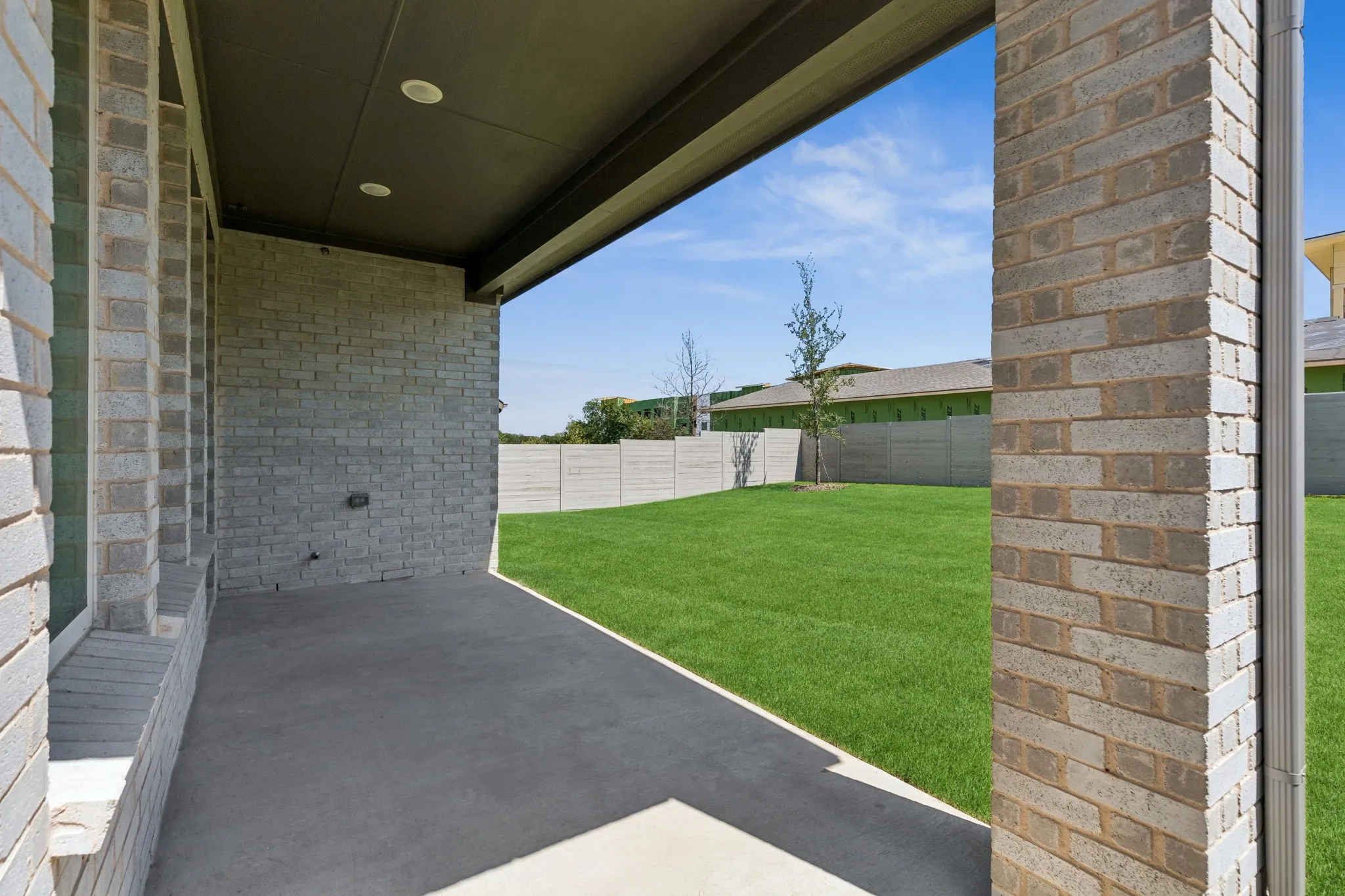 Dining al fresco is in your future on this lovely covered back patio!