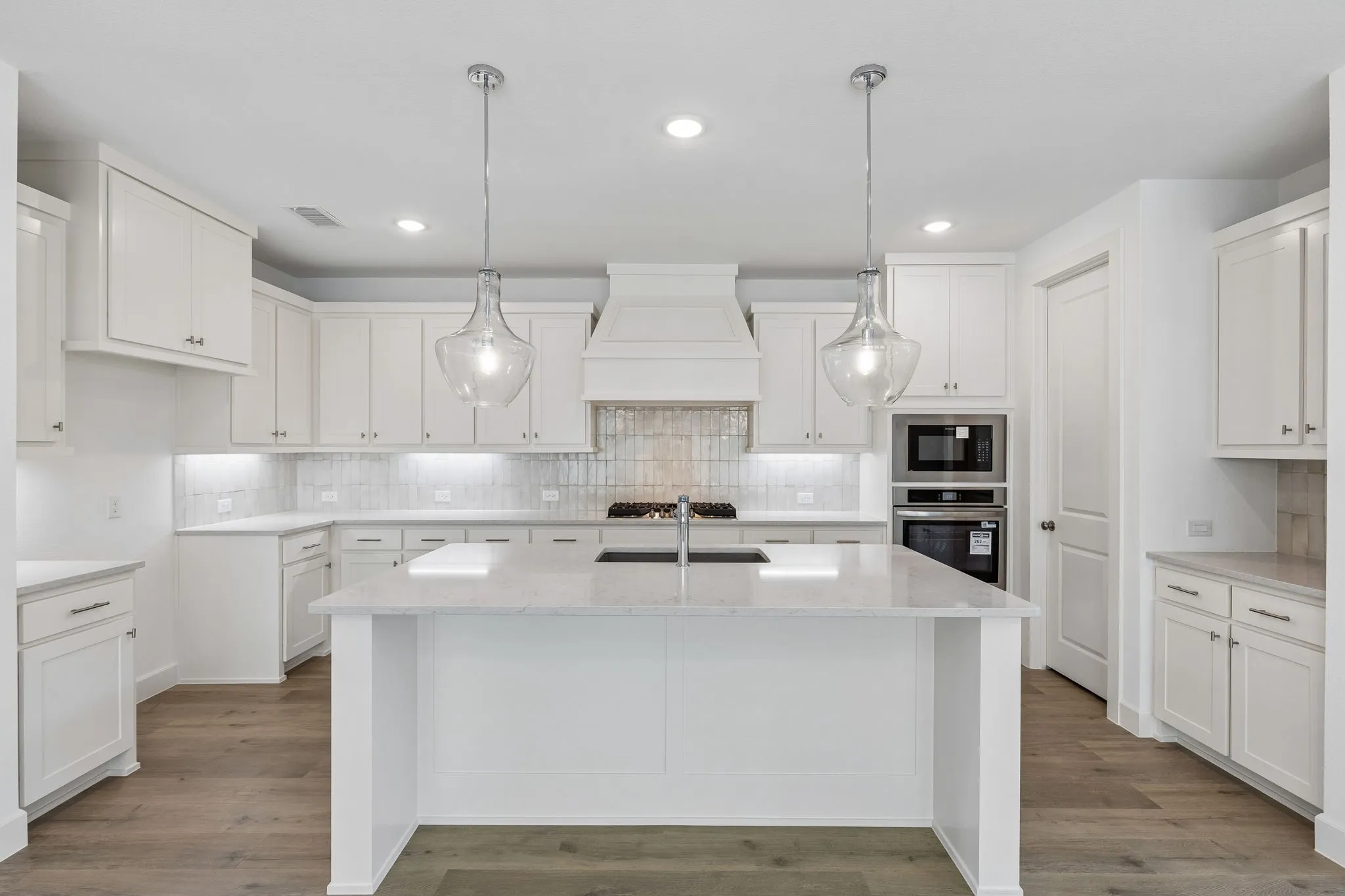 Your spacious kitchen island is the perfect place for friends and family to gather round!