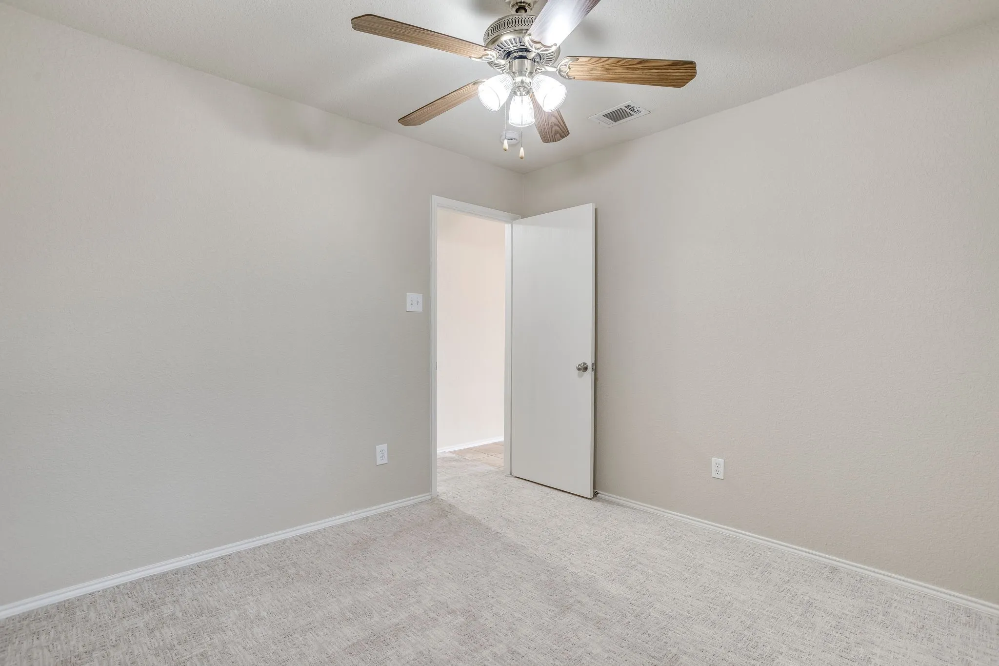 Neutral-toned wall paint with a textured finish