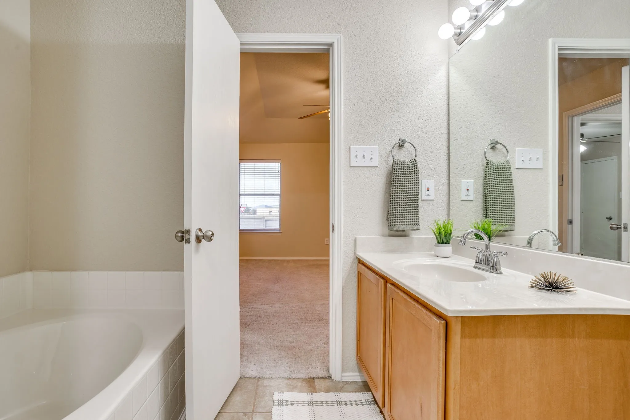 Built-in bathtub with tiled surround