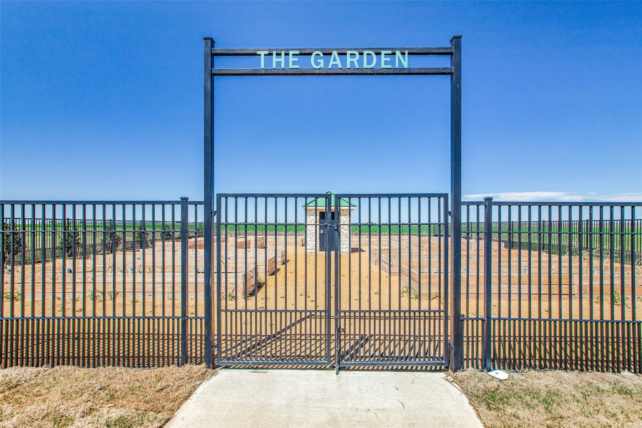 Residents can enjoy a dedicated community garden, offering a charming shared space to grow fresh vegetables, herbs, flowers, and plants. This unique neighborhood amenity provides a wonderful opportunity to garden, connect with neighbors, and enjoy time outdoors.