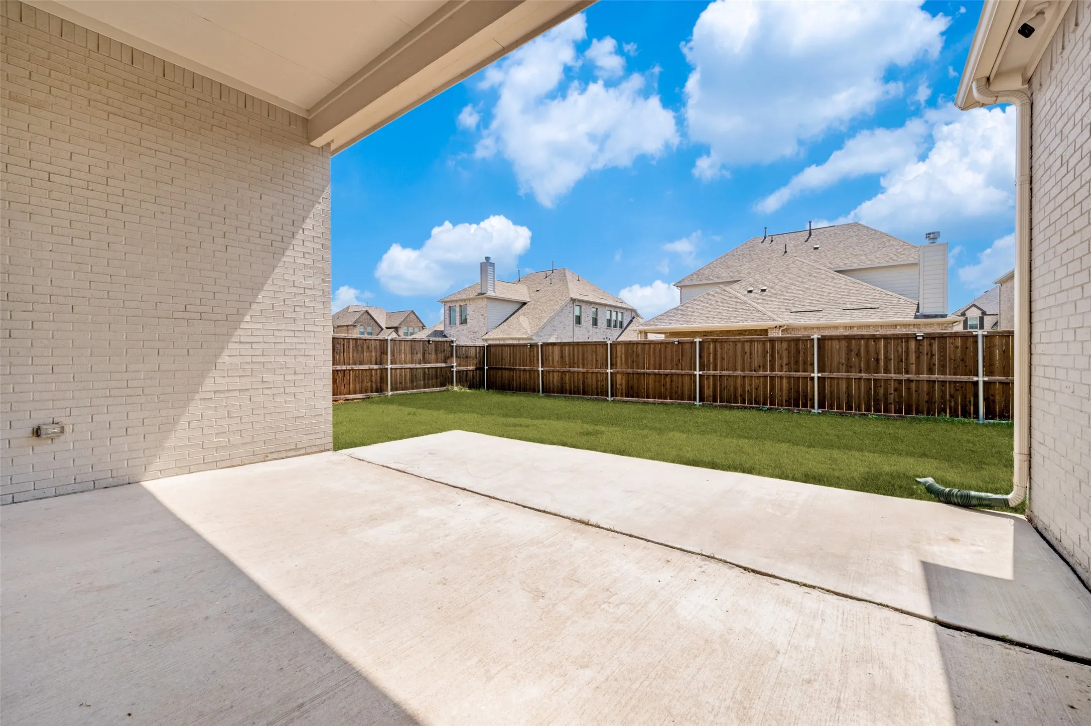 Enjoy outdoor living on the extended covered patio, offering an abundance of space for relaxing, dining, and entertaining. Overlooking the spacious, fully fenced backyard, this generous outdoor area provides the perfect setting for everything from quiet mornings to gatherings with family and friends.