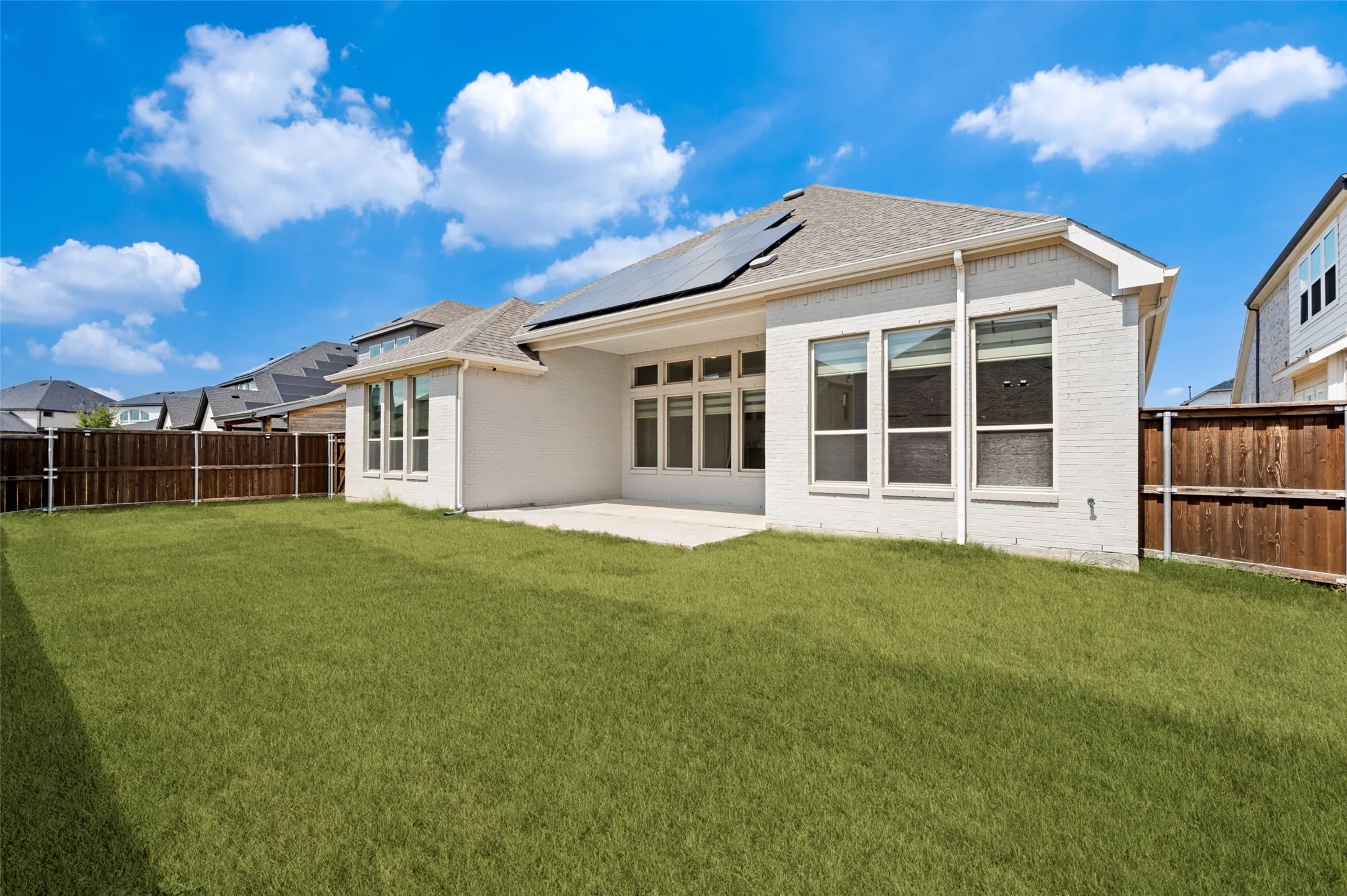 Enjoy a spacious, private backyard with plenty of lush green lawn for outdoor activities, pets, or future enhancements. The covered patio provides a comfortable spot for outdoor dining, relaxing, and entertaining, while the fully fenced yard offers added privacy and room to create your own backyard retreat.