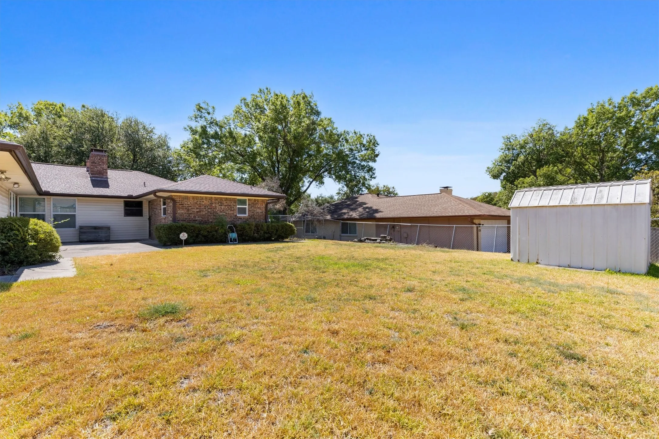 Large Yard with Storage Shed!