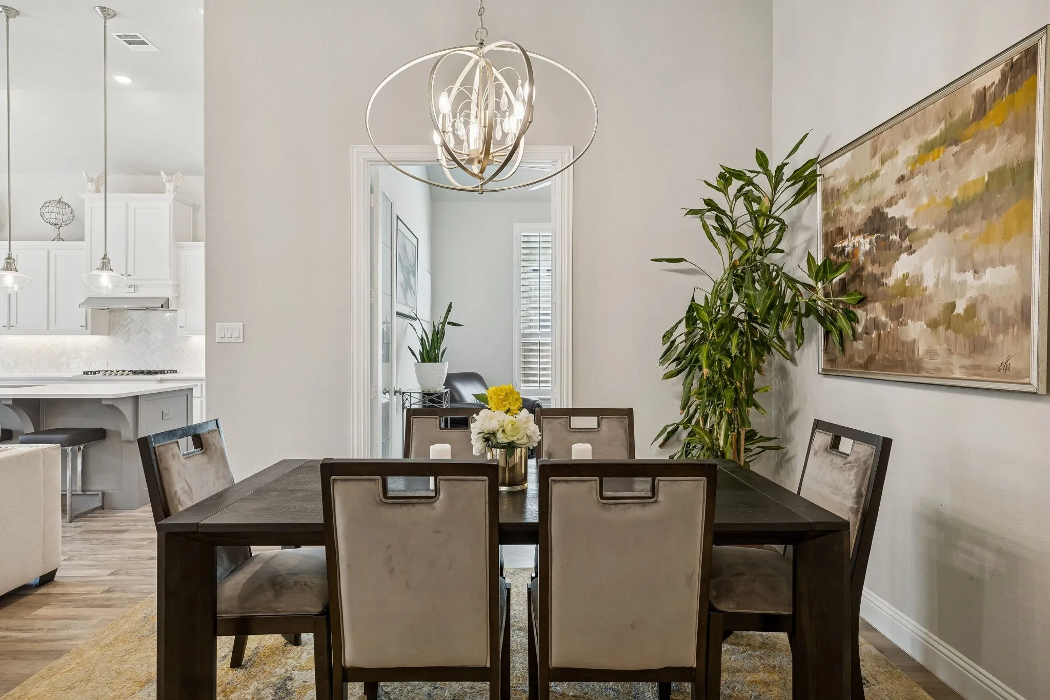 formal dining with beautiful modern lighting