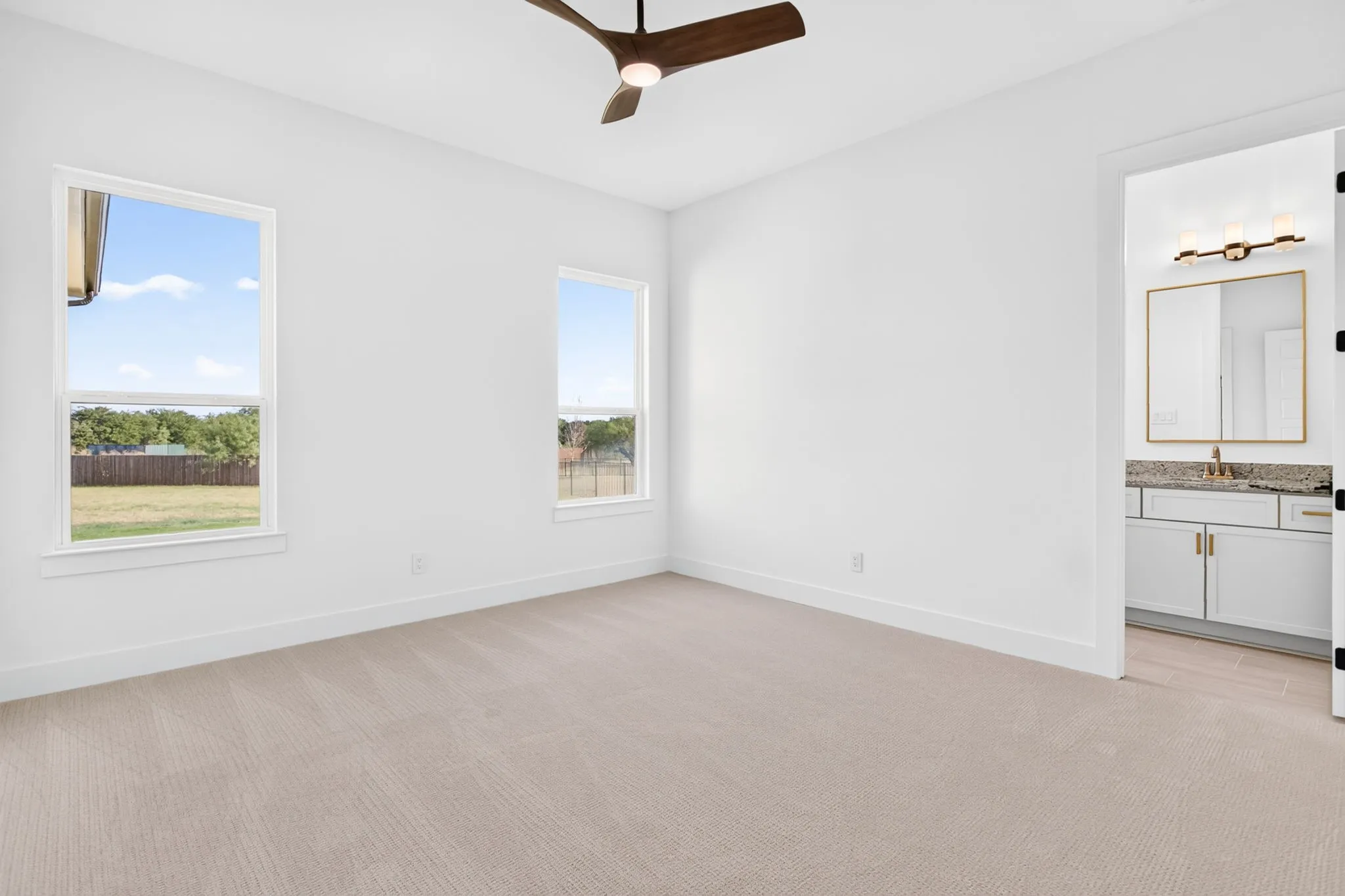 The last secondary bedroom enjoys its own ensuite bathroom.