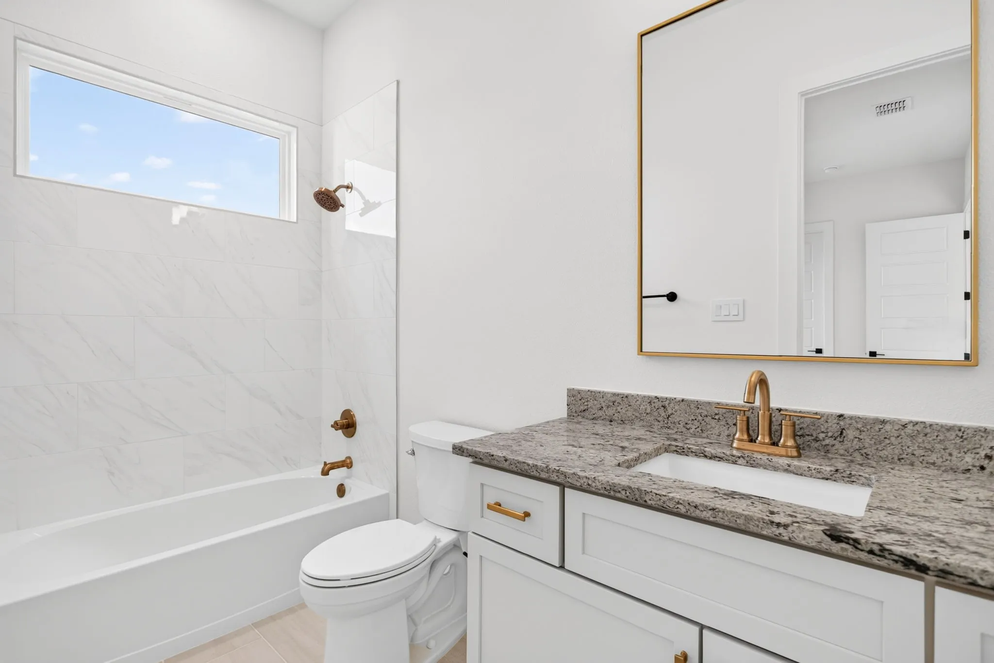 Again - love the custom mirrors, the hardware, the tile and cabinetry color.