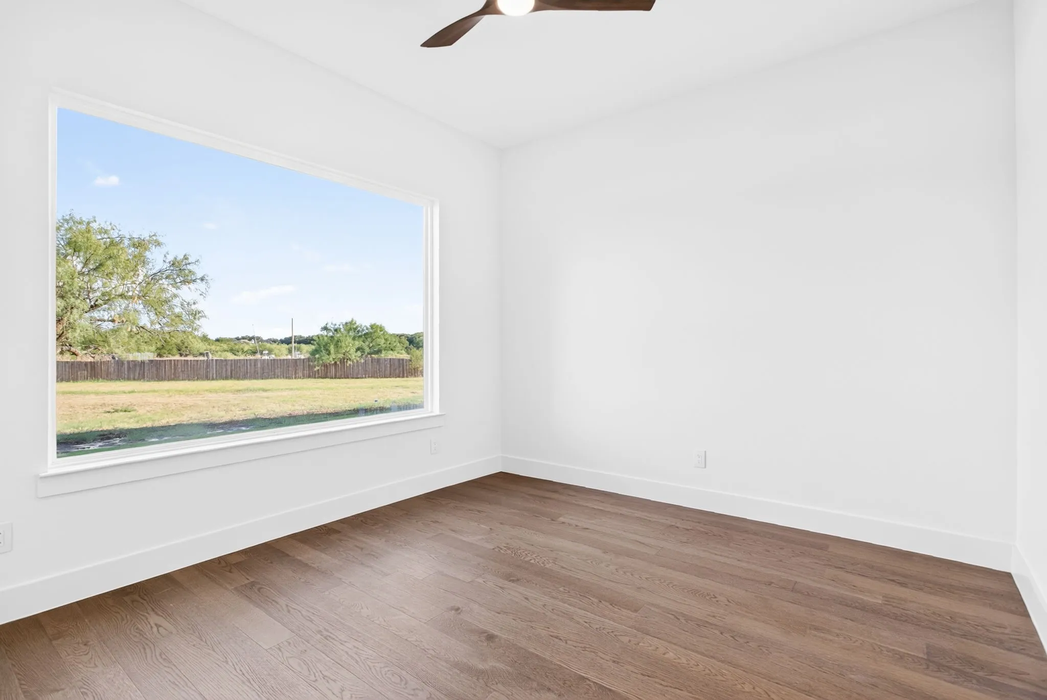 Located just off the kitchen and outside the primary is this flex room. Make it an office, a gym, a nursery, a craft room - and enjoy the BIG second pantry-storage closet right across the hallway.