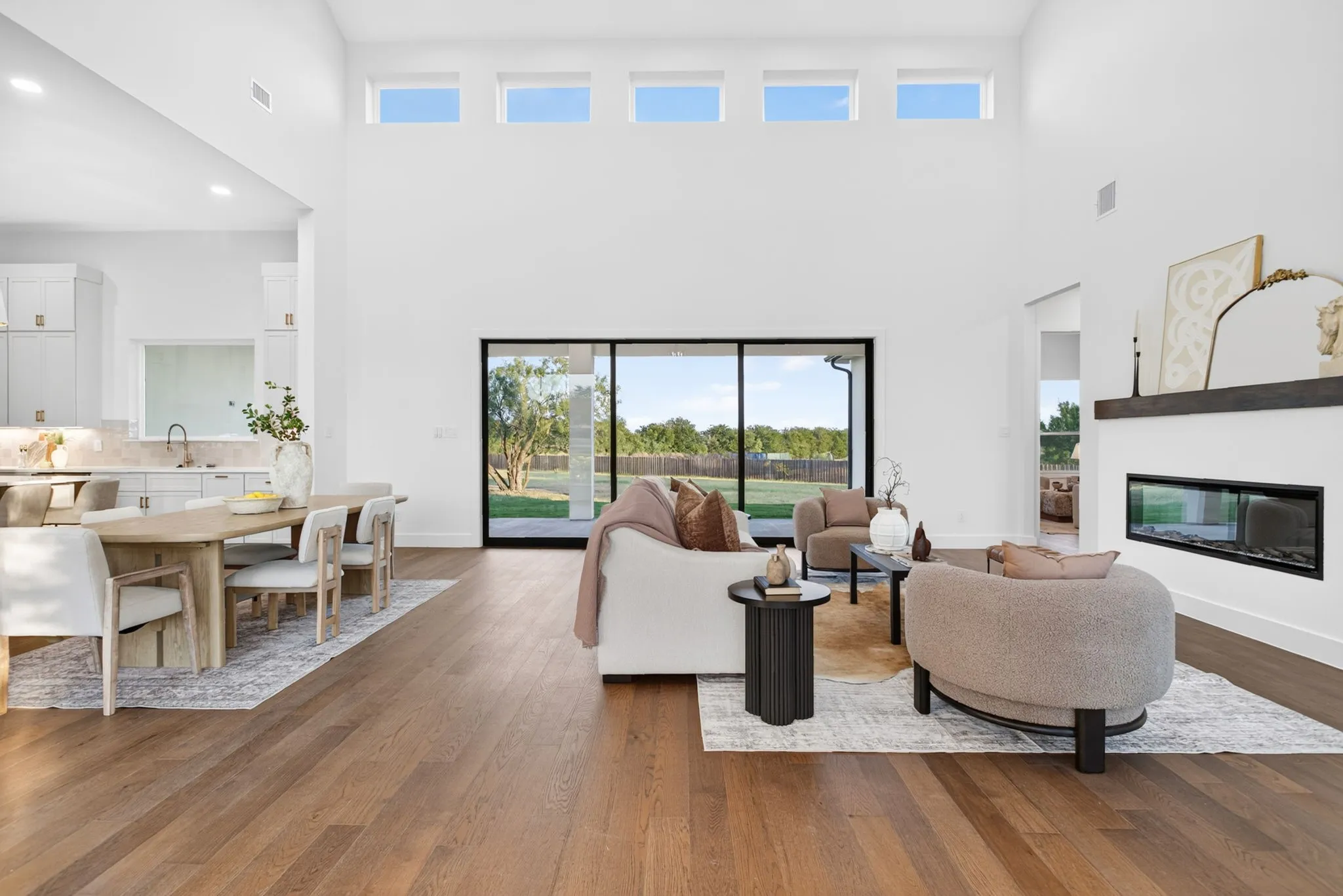 Engineered wood flooring to take everything you can throw at it; this immediate space off the foyer really makes a statement.