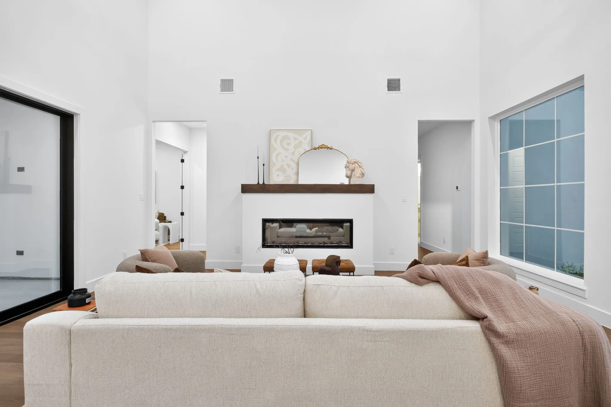 Hallway to the right - bedrooms. Hallway to the left - a 5th bedroom or 2nd living area with powder bath. SO smart.