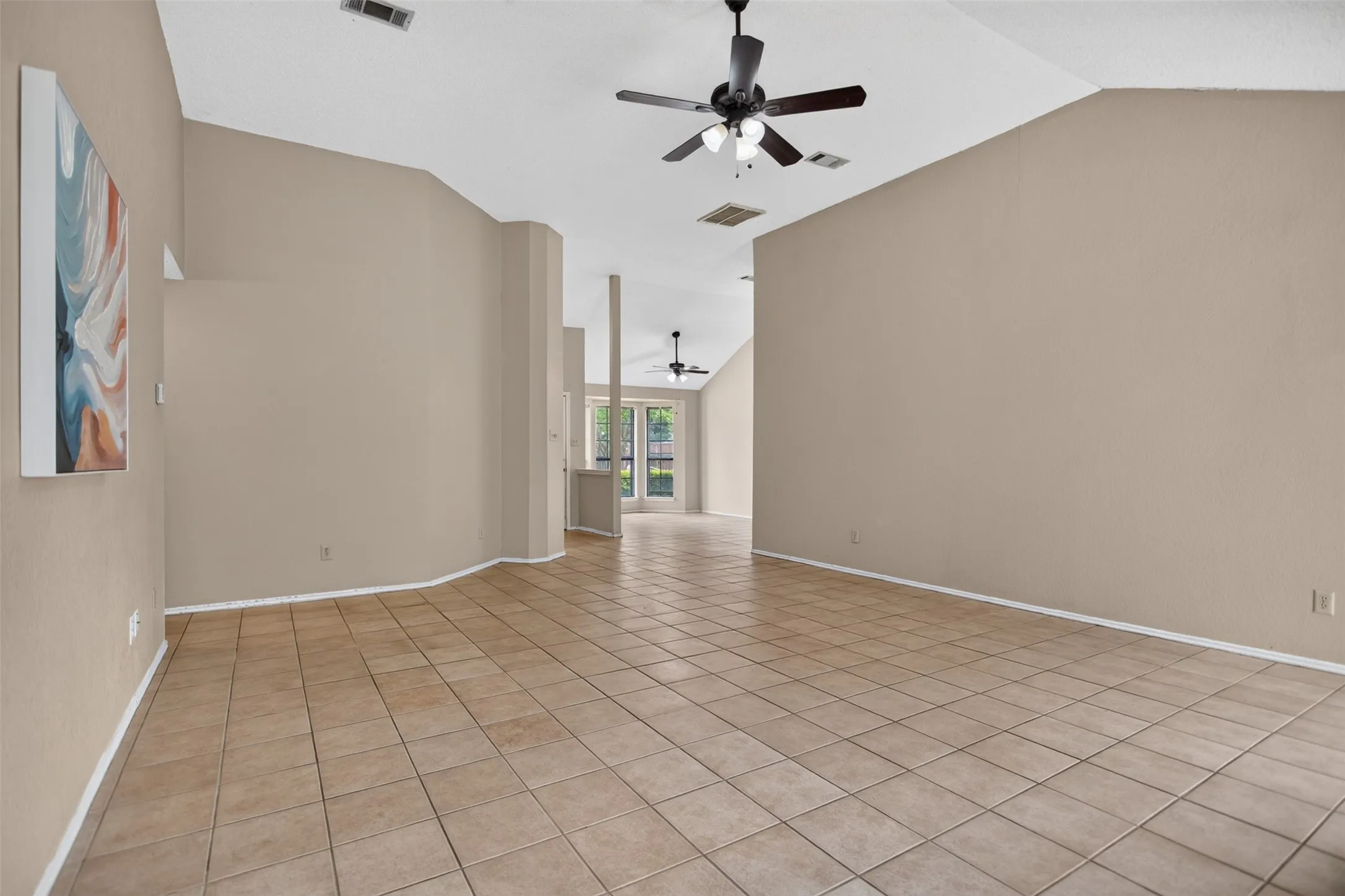 Another view of the living space and high ceilings.