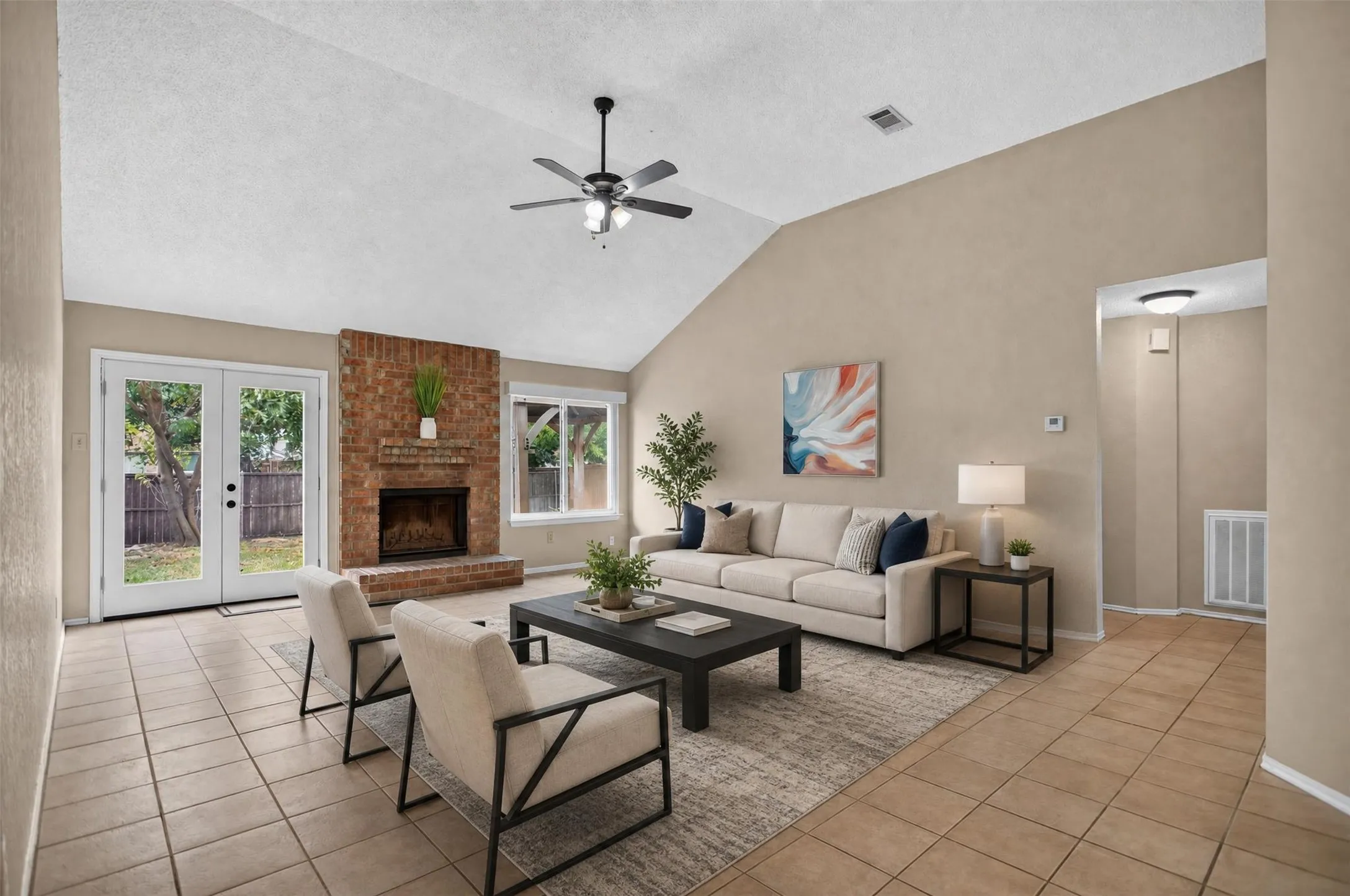 High ceilings and lots of natural light in the living room.