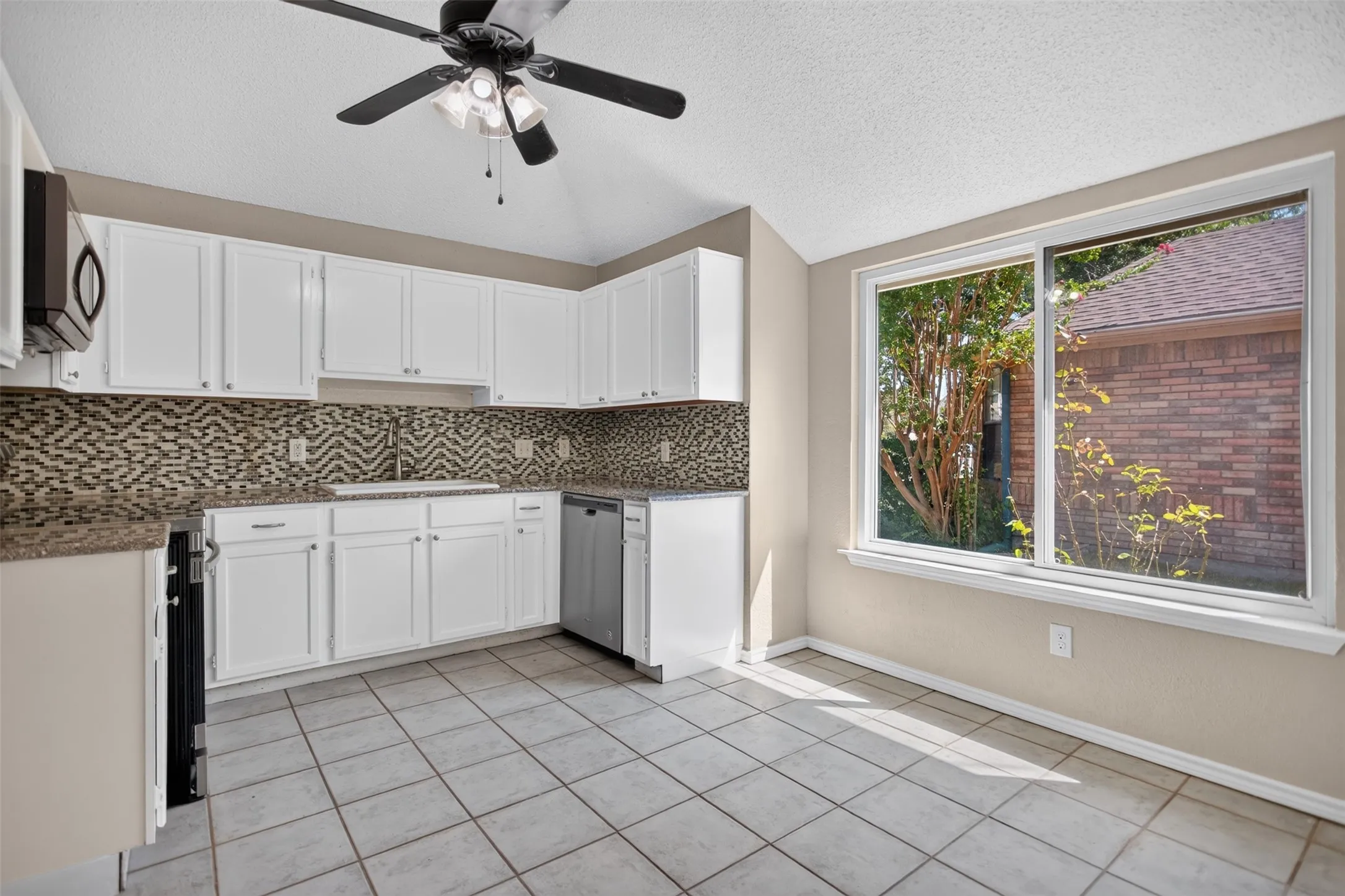 Bright white kitchen with tons of natural light.