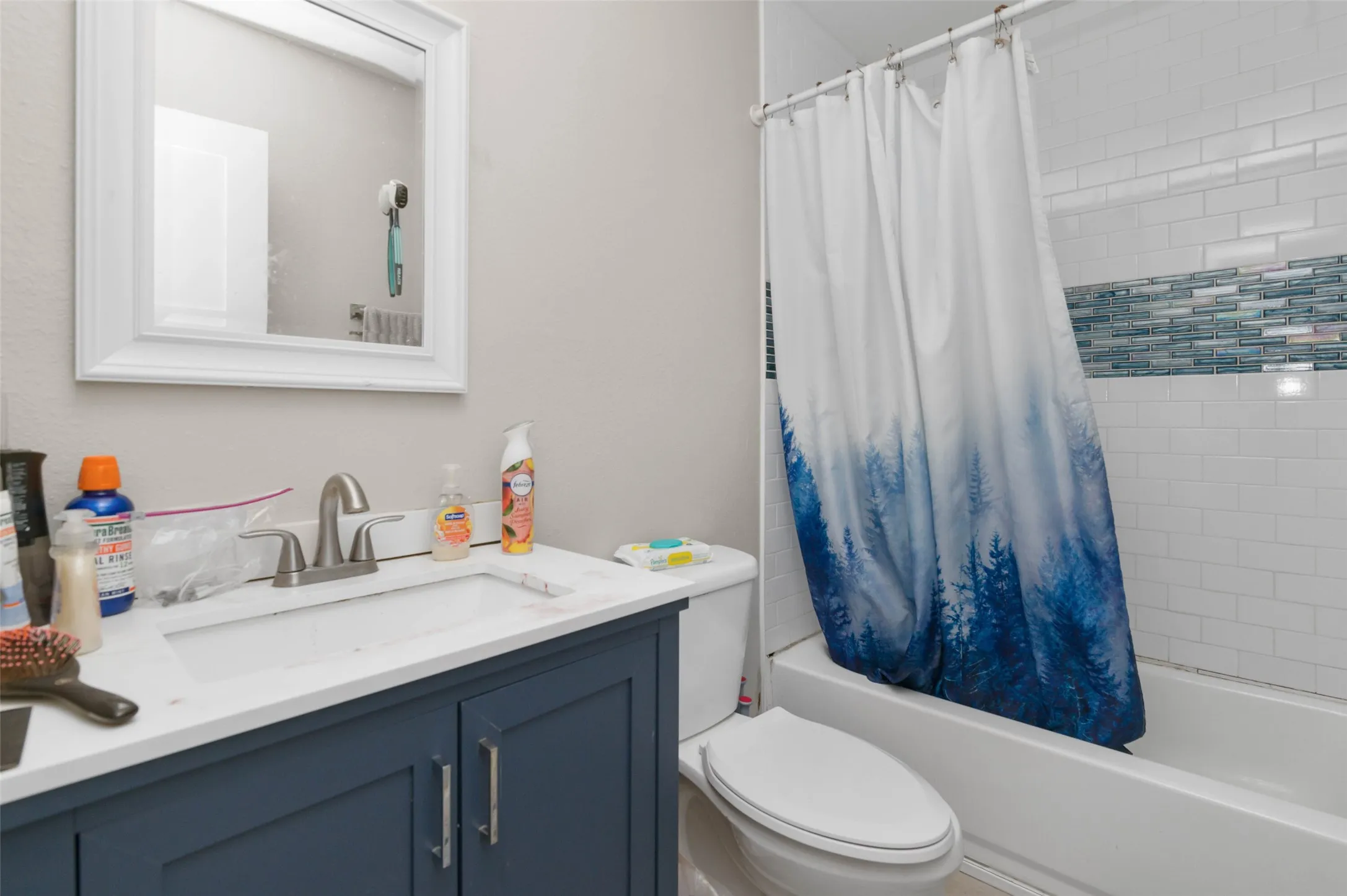 Bathroom with custom tile shower.