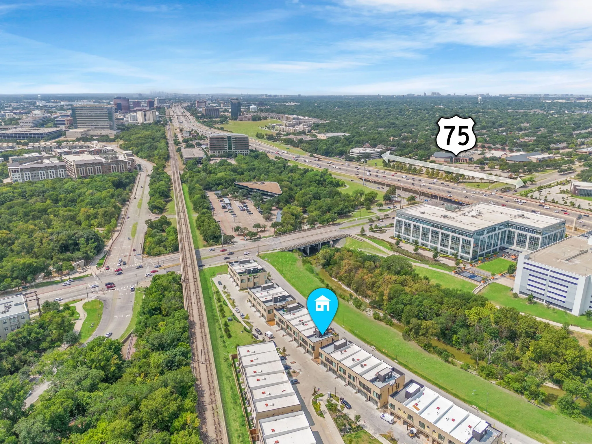 Aerial perspective showing multiple townhome-style properties