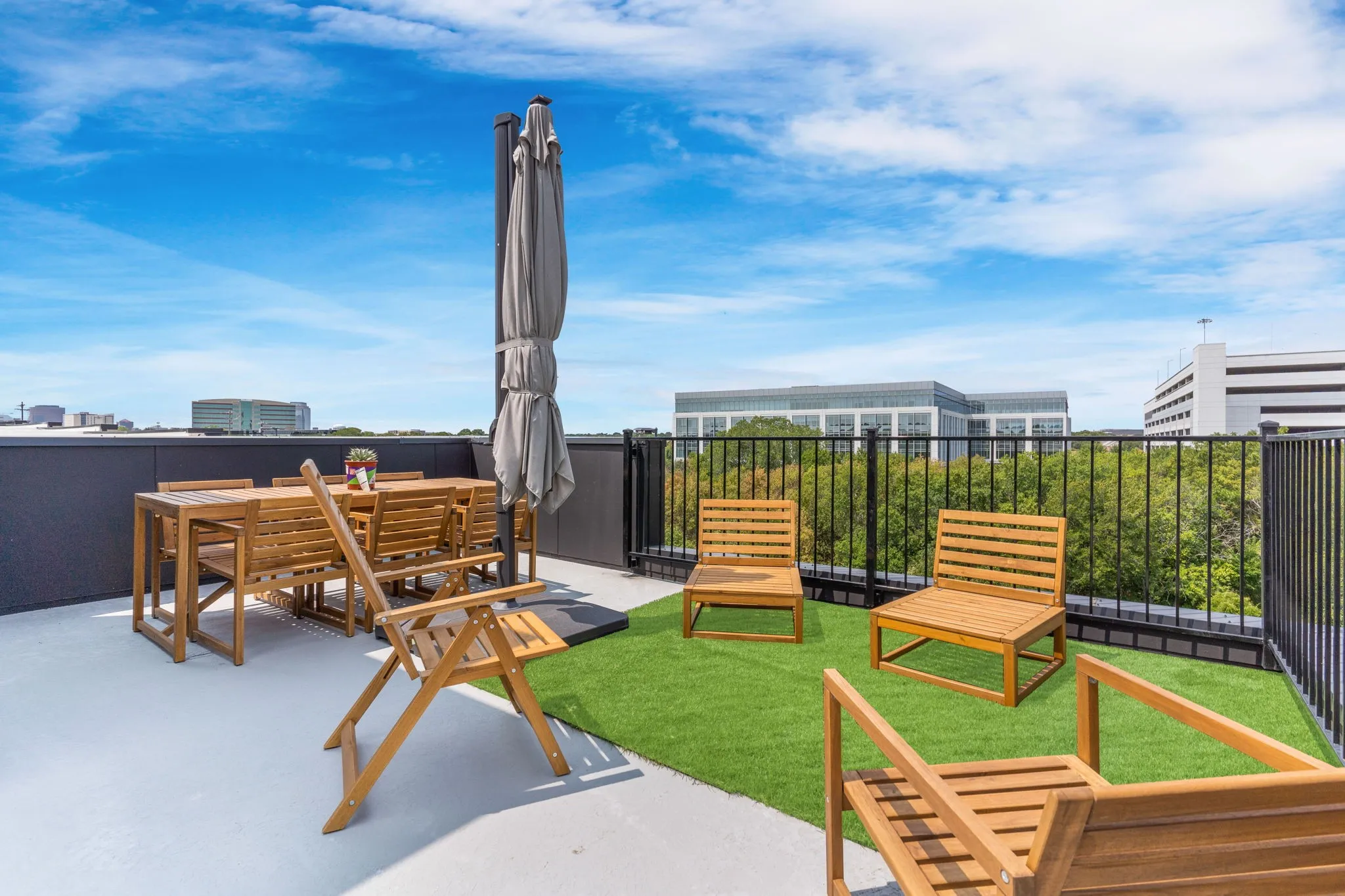 Rooftop terrace with a combination of hardscape and artificial turf