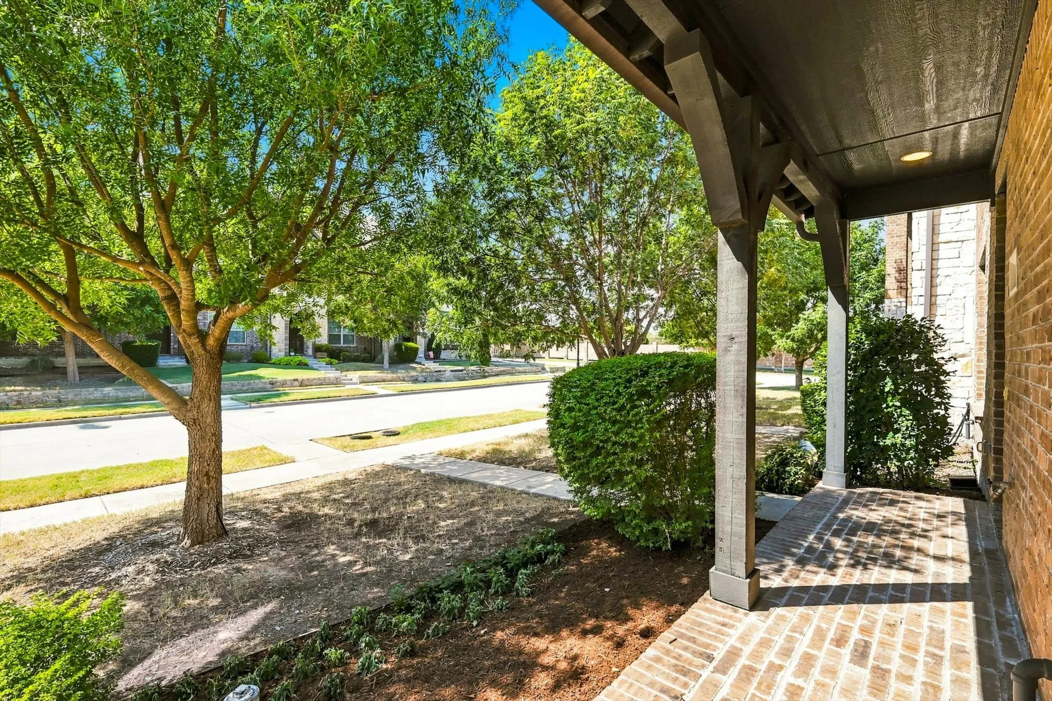 Mature landscaping and a private entry walk welcome you home