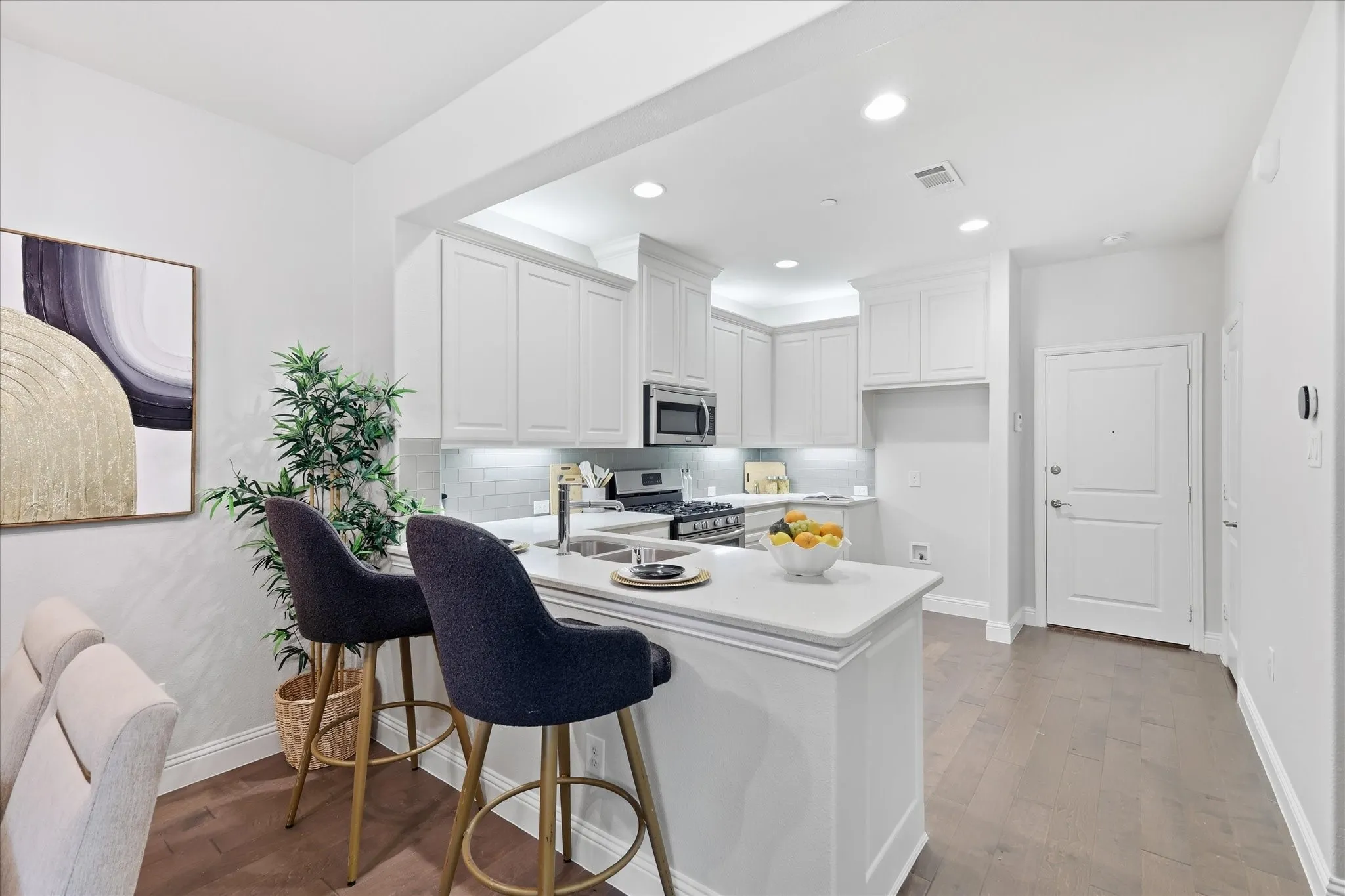 Sunlit dining space flows seamlessly into the kitchen which is ideal for entertaining