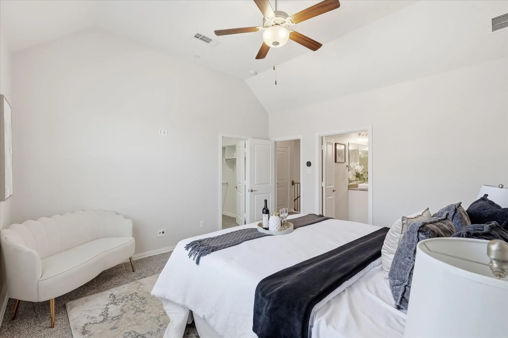 The primary suite offers a private layout with direct access to a walk-in closet and ensuite bath.