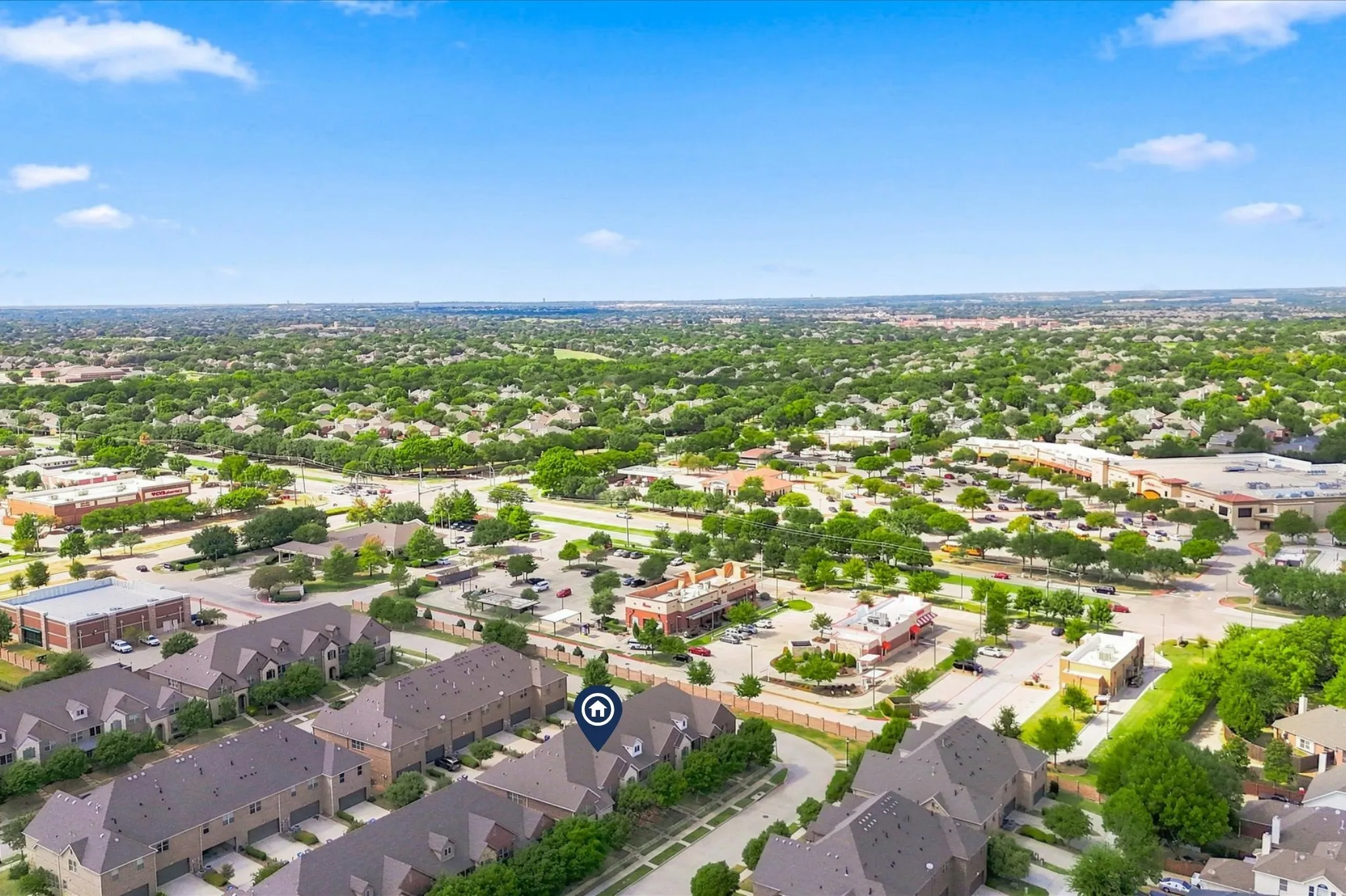 Aerial view highlights the well-kept Villas at Stonegate community and convenient street access
