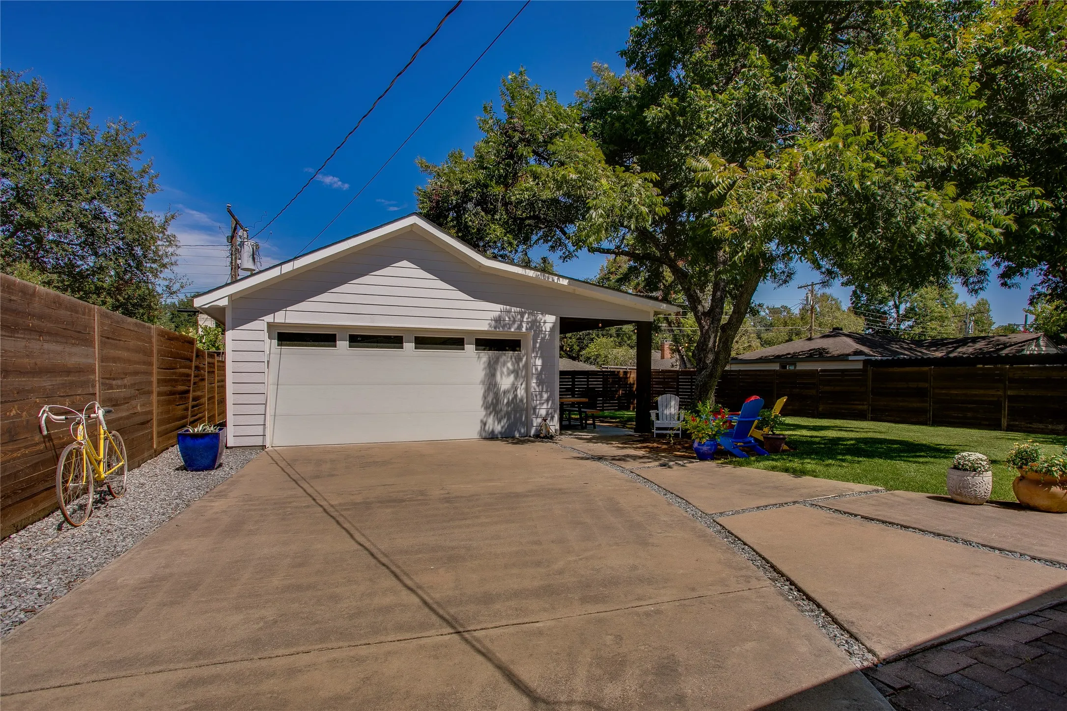 Recent garage built from ground up with covered patio area