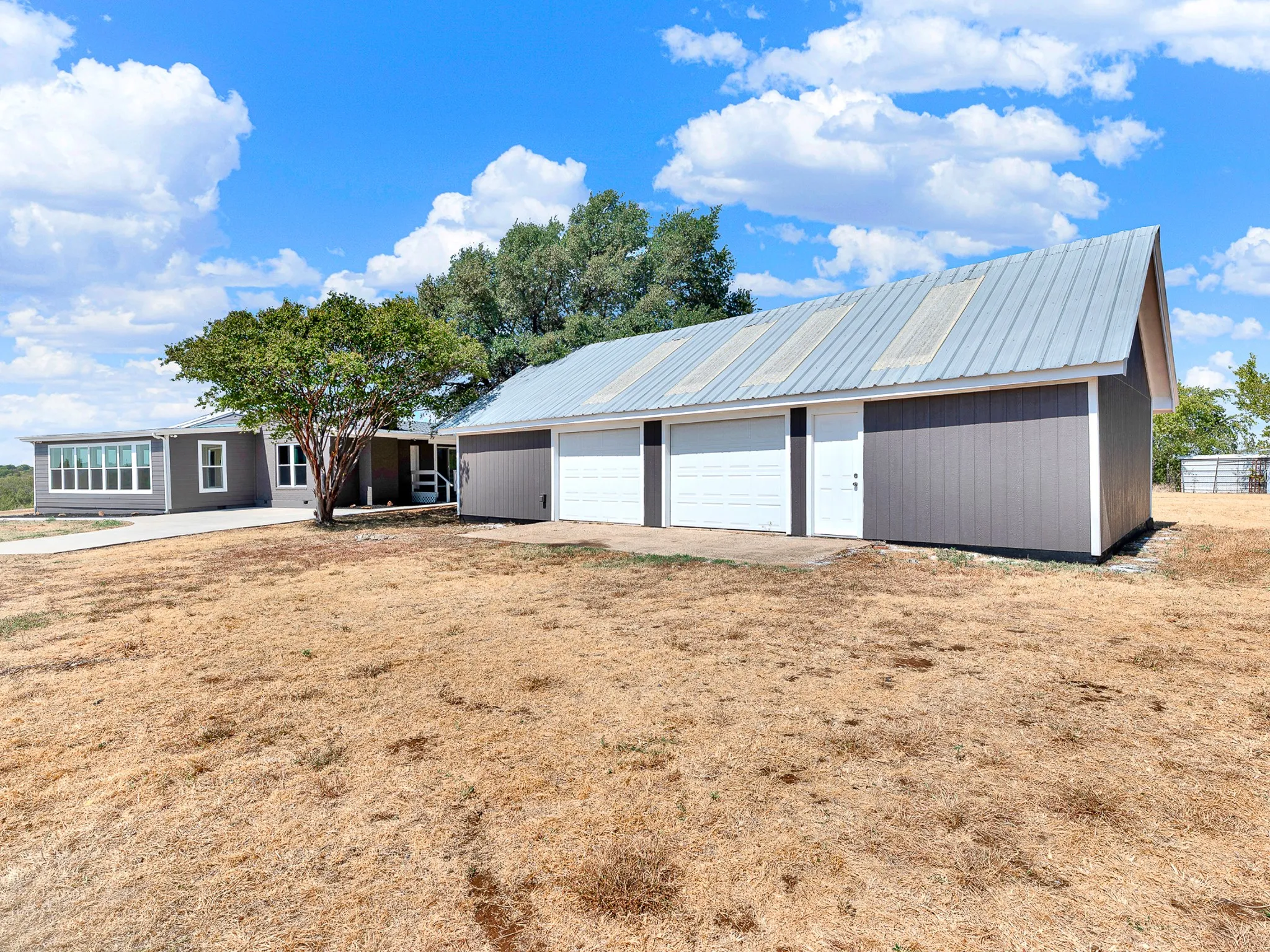 Front of structure with workshop and garage