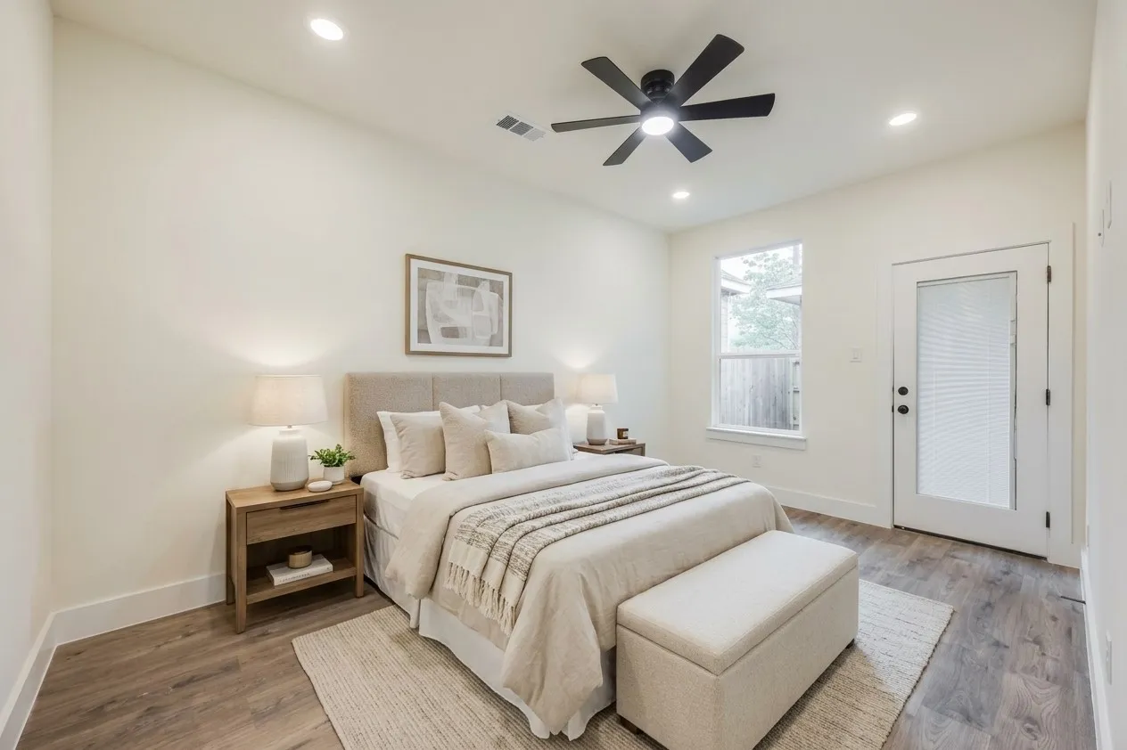 Recessed lighting, wood-finish flooring, ceiling fan, and a glass-paneled exterior door