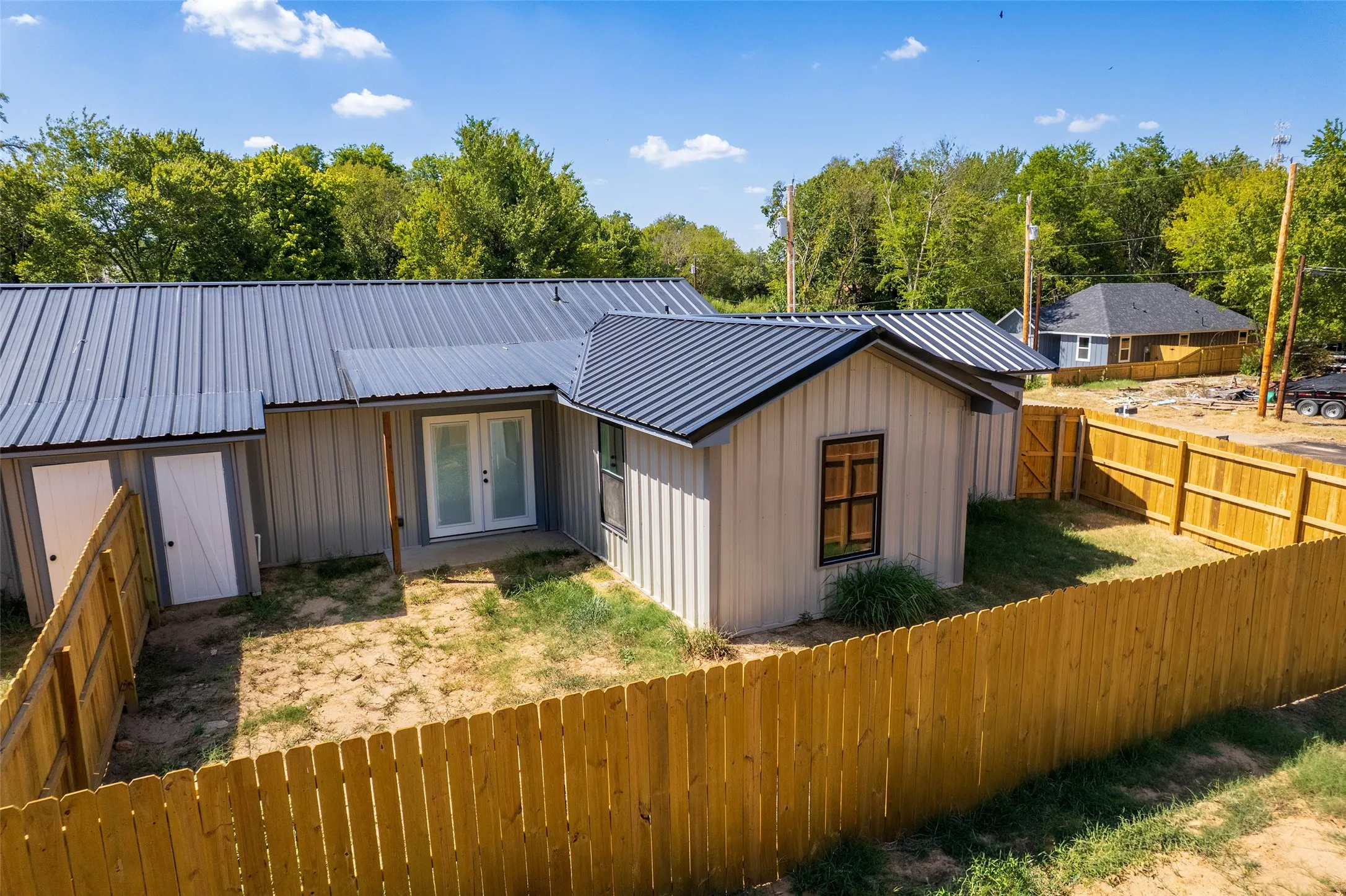 Fenced backyard, fence for privacy, covered back porch