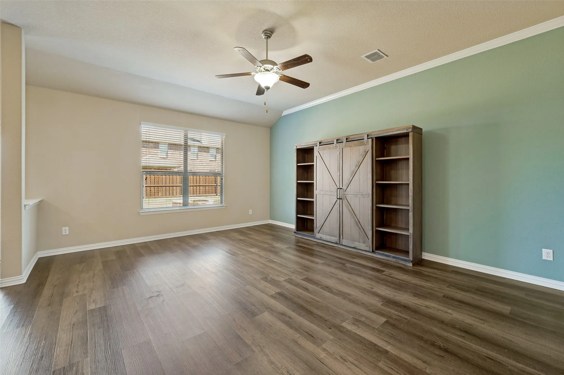 Living room comes with entertainment center.