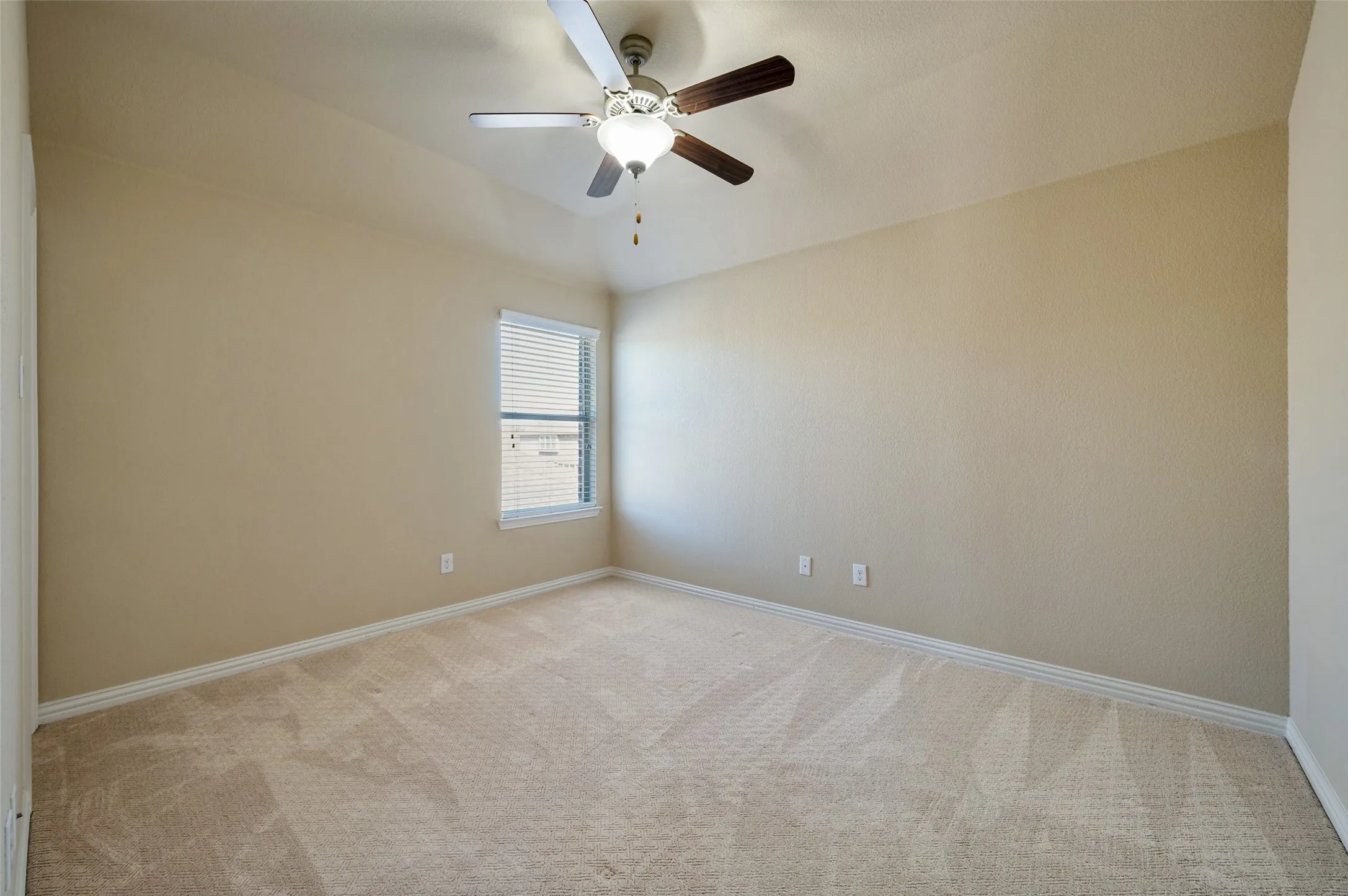 Second floor bedroom with adjacent full bath.