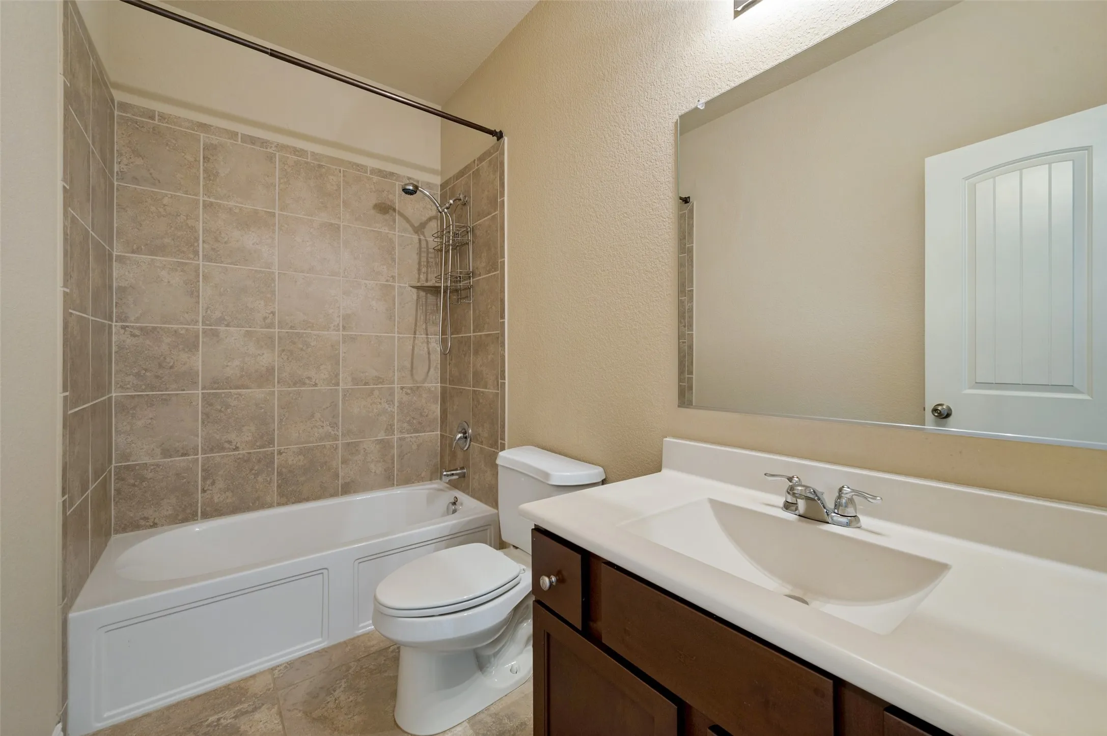 First floor full bath with adjacent guest room.