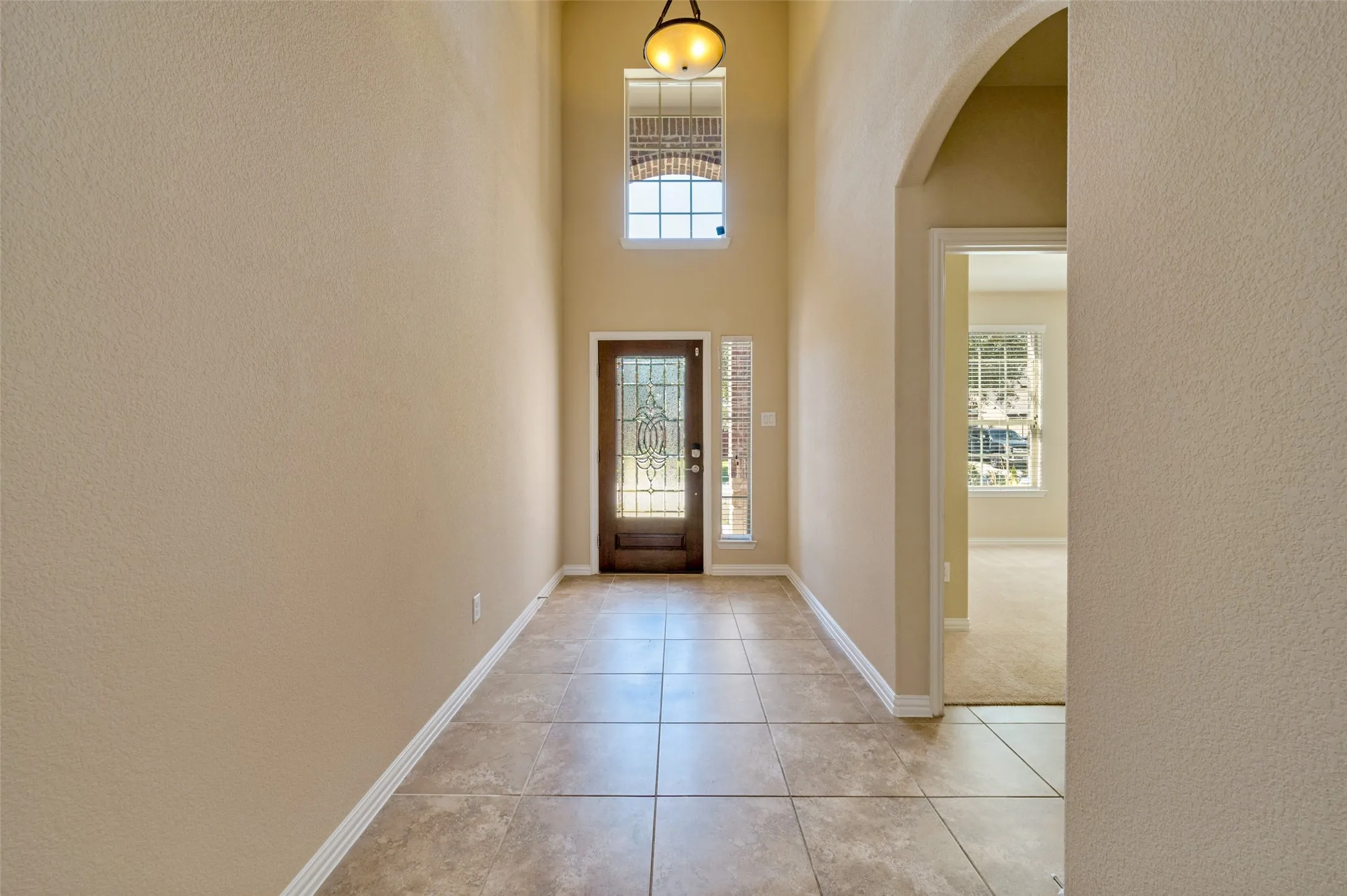 Light, bright entry with soaring ceiling.