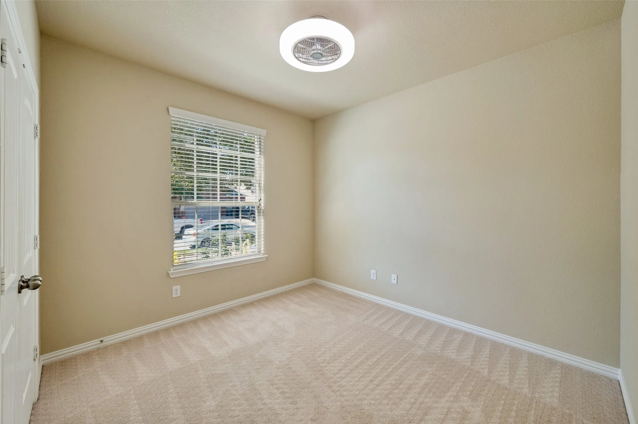 First floor guest bedroom with adjacent full bath.