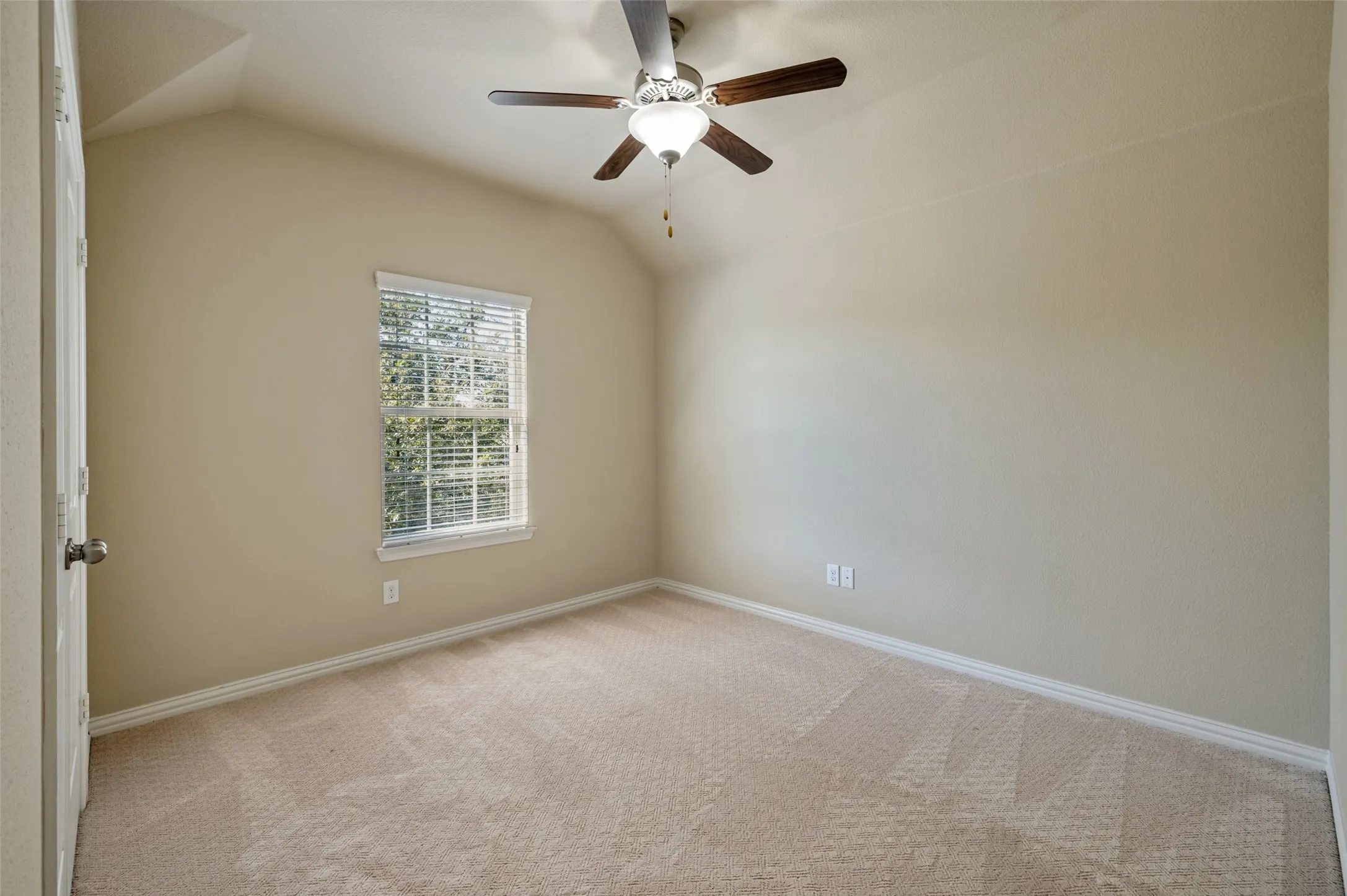 Second floor bedroom with adjacent full bath.
