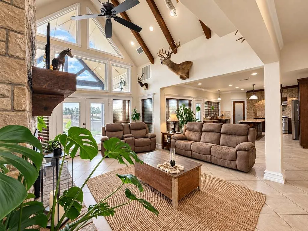 Open living area connects the kitchen and gathering spaces.