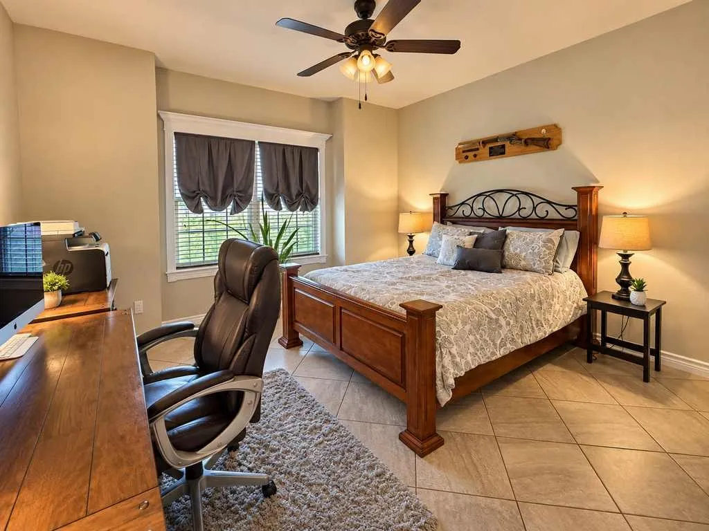Additional bedroom with natural light and space for a desk or reading nook.