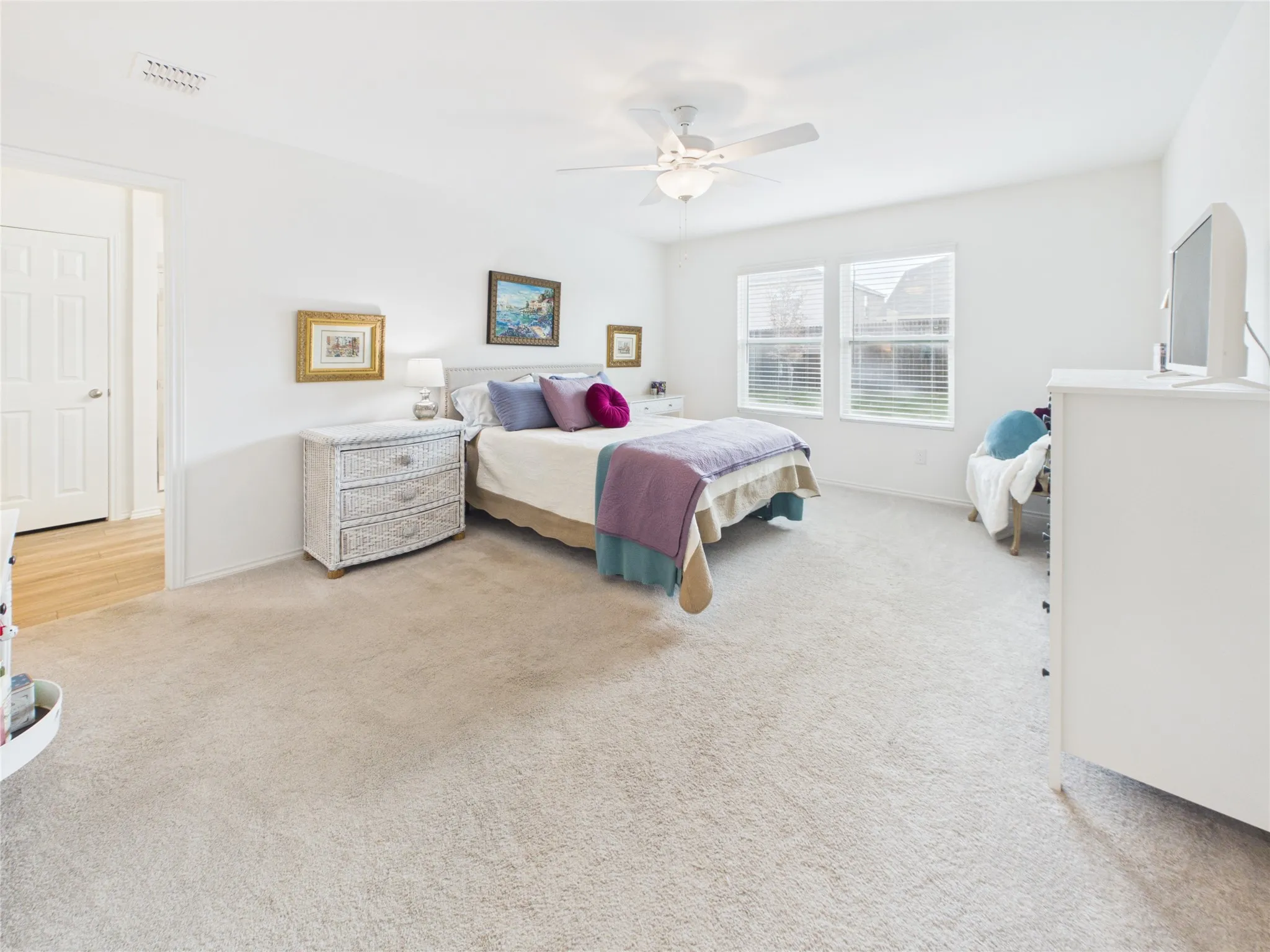 Primary bedroom that is fit or a king and or queen with room for sitting including it own ensuite bathroom with large walk in shower, dual sinks , linen closet and walk in closet.