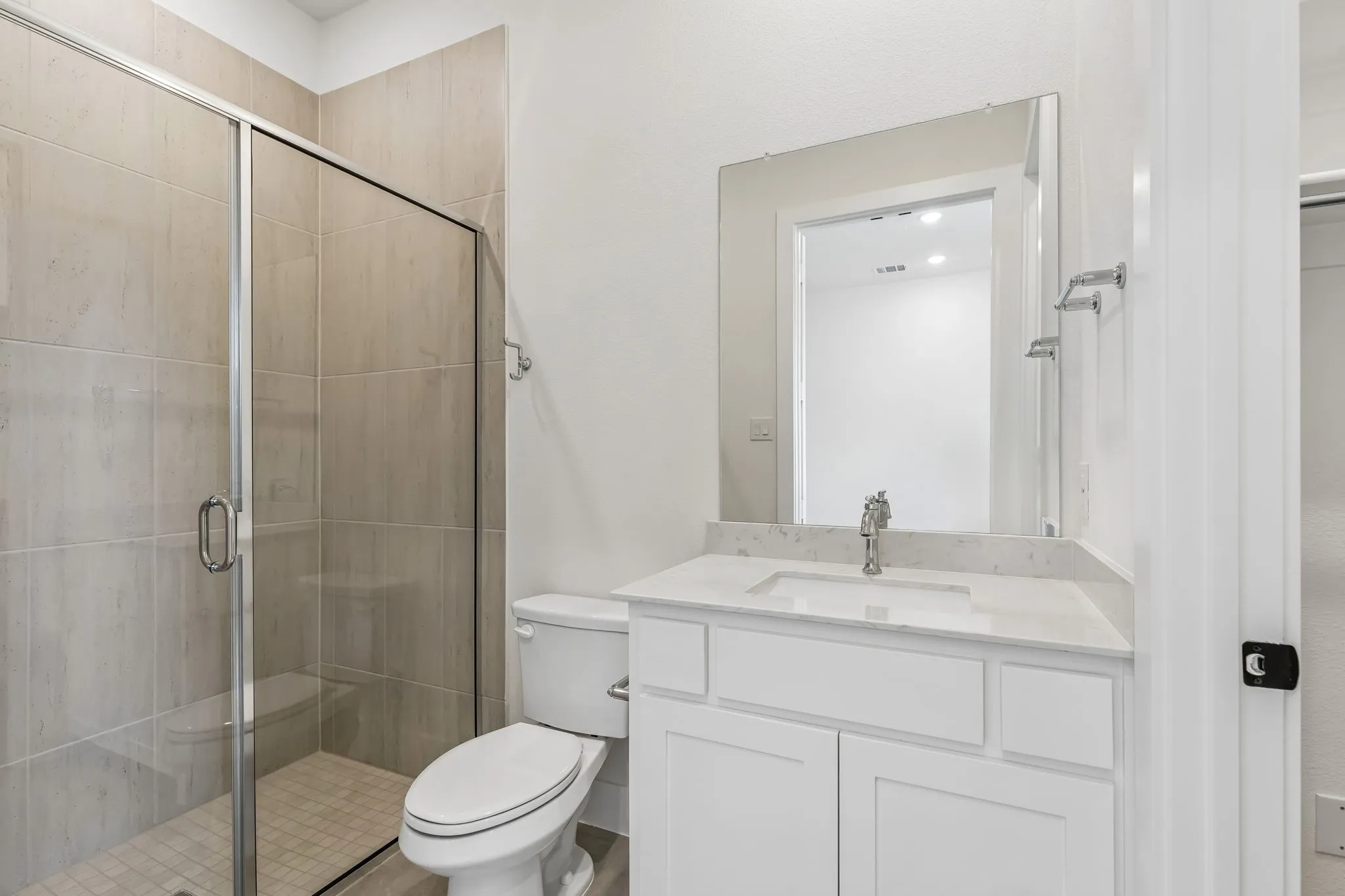 Friends and family will feel right at home in any of the beautifully finished guest baths this dream home offers!