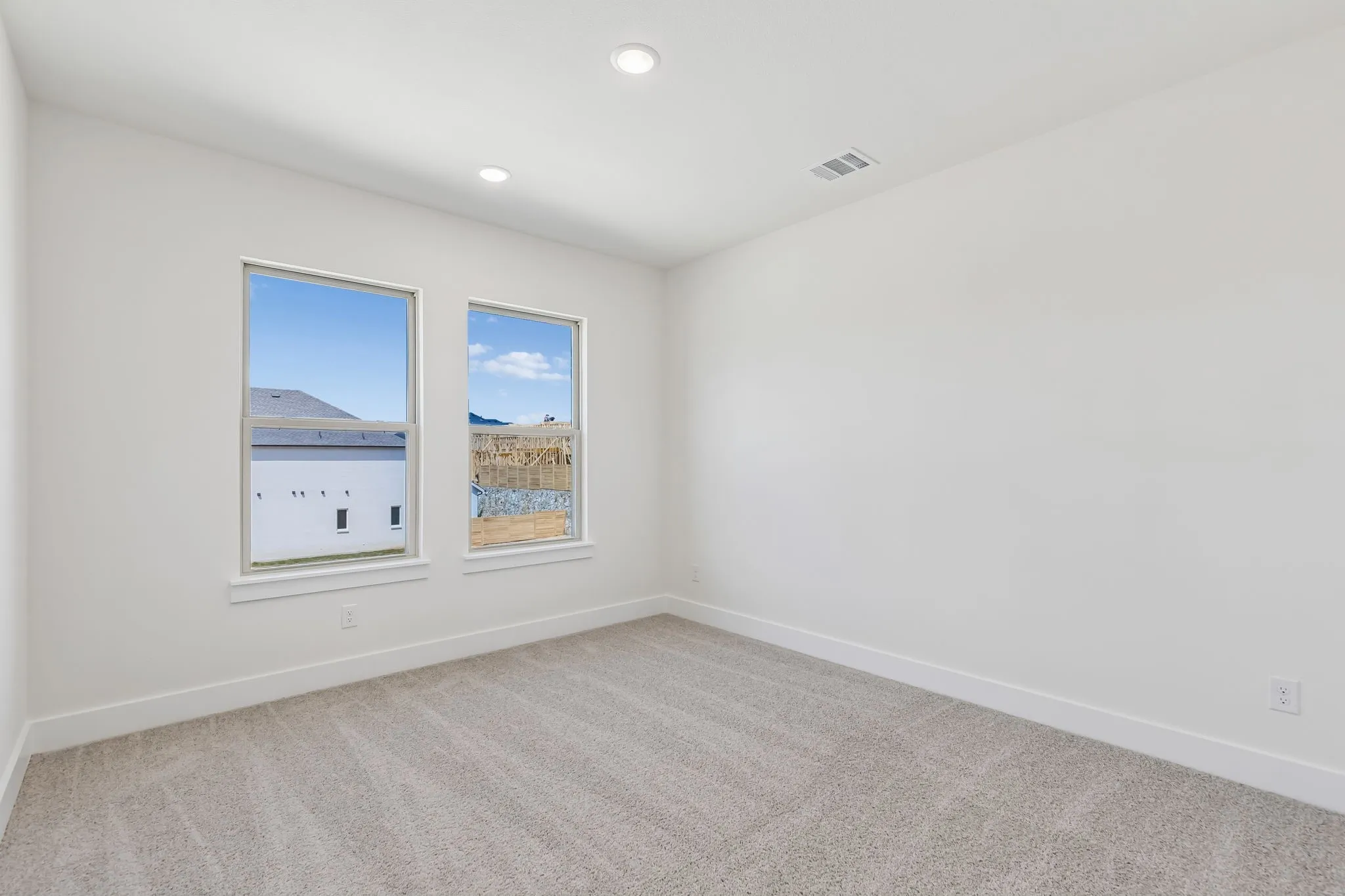 You'll find nicely sized secondary bedrooms in our Justin plan.