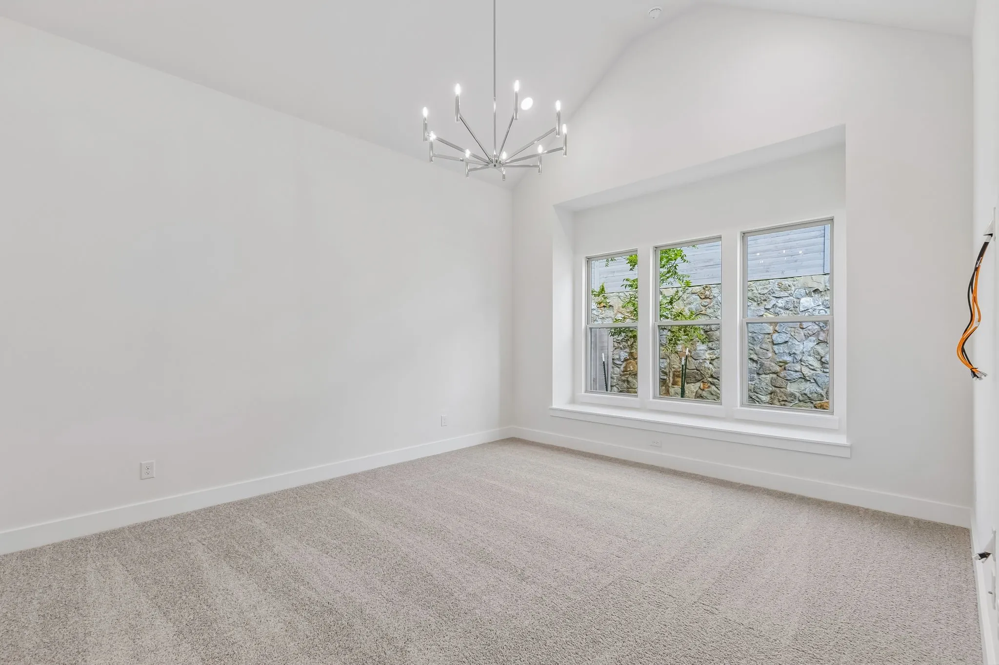 The peaceful and relaxing owner's suite is located at the rear of the home for additional privacy.